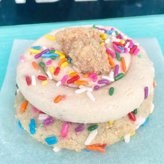 Order Frosted Birthday Cookie food online from The Cookie Dough Cafe store, Portland on bringmethat.com
