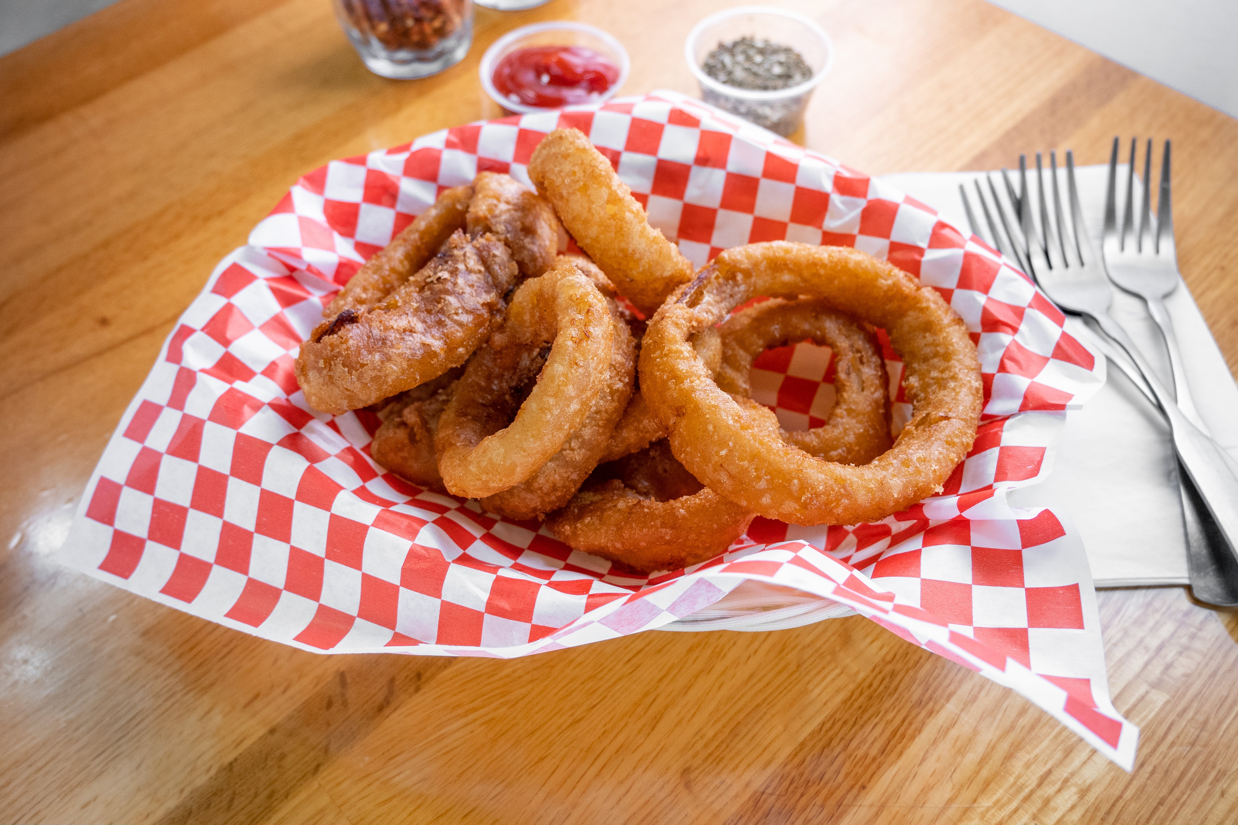 Order Onion Rings - Side food online from Tony's Pizza & Pasta store, Plymouth Meeting on bringmethat.com