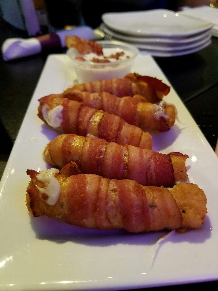 Order Bacon Mozzarella Sticks - Appetizer food online from Sebastian Ale & Whiskey House store, Brookfield on bringmethat.com