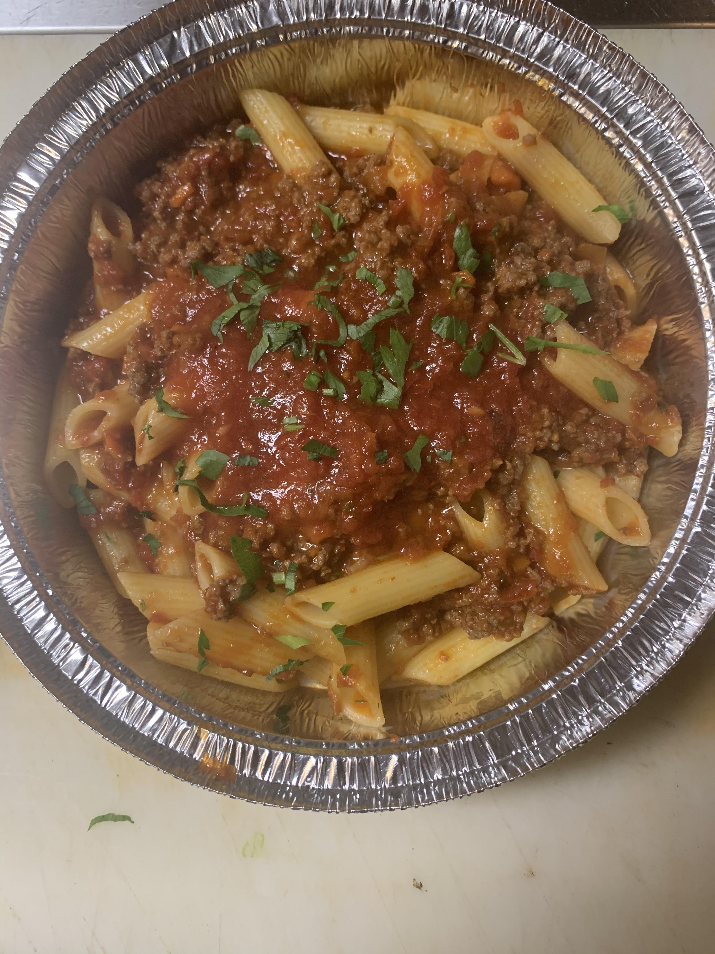 Order Pasta Bolognese food online from Toscana Pizzeria store, Audubon on bringmethat.com