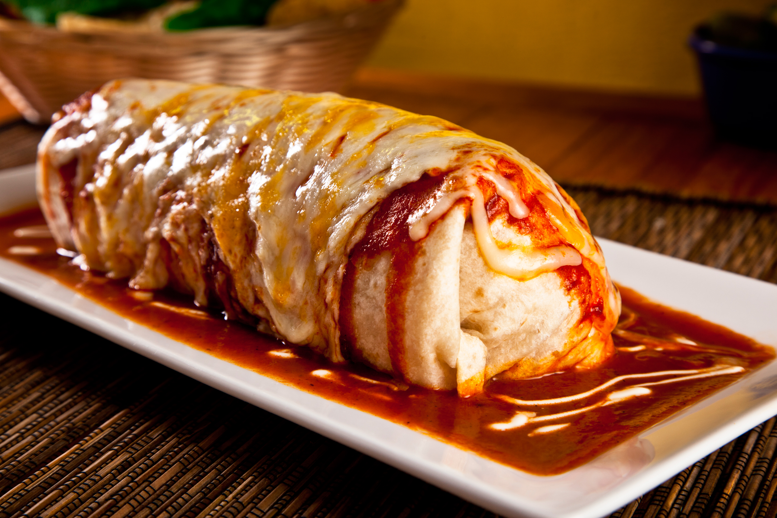 Order Enchilado Suizo Burrito food online from Mixteco Mexican Grill store, Chicago on bringmethat.com