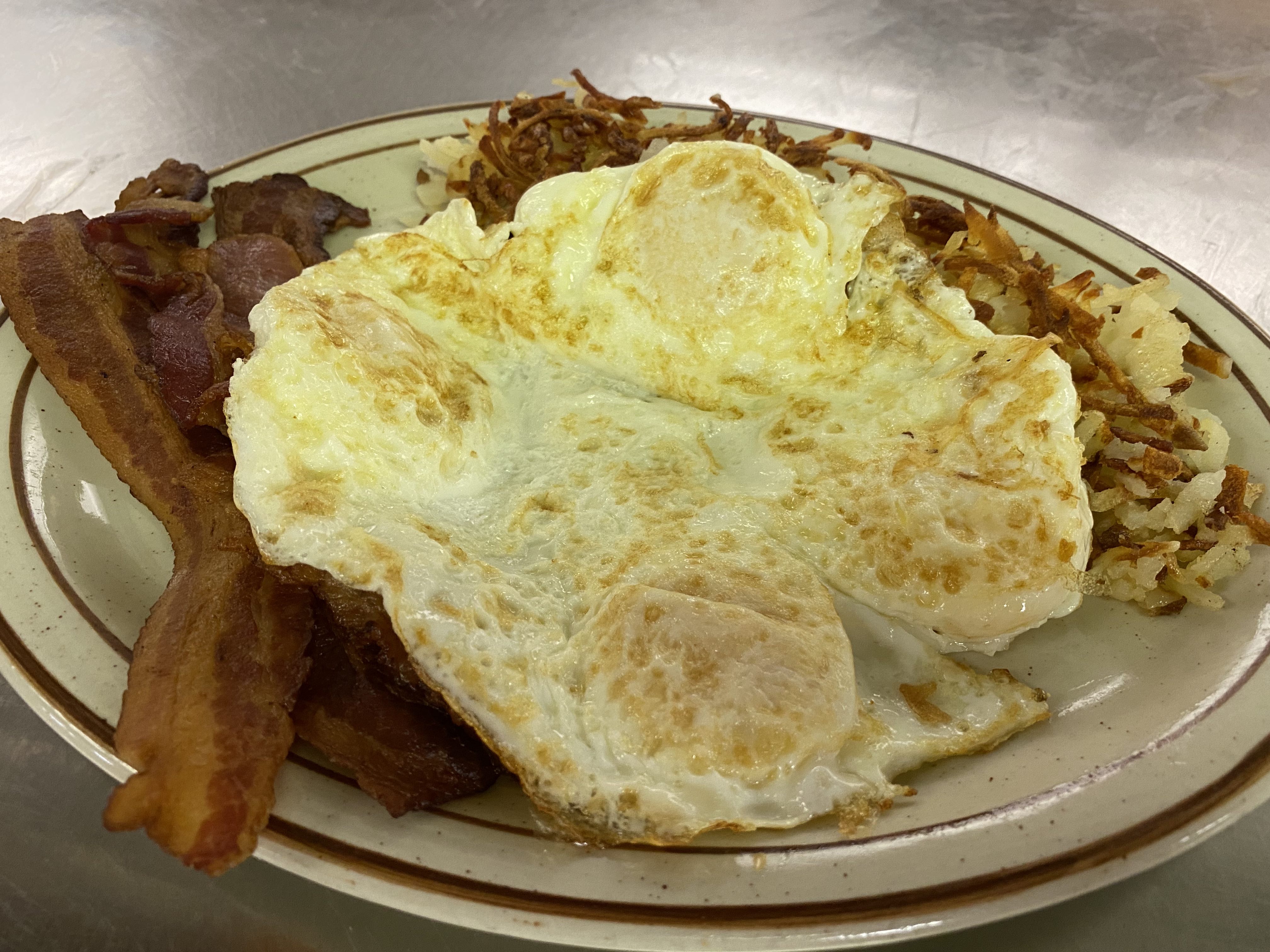 Order Country Fresh Eggs with toast or panackes & hashbrowns + add sausage or bacon food online from Carver Family Restaurant store, Richmond on bringmethat.com