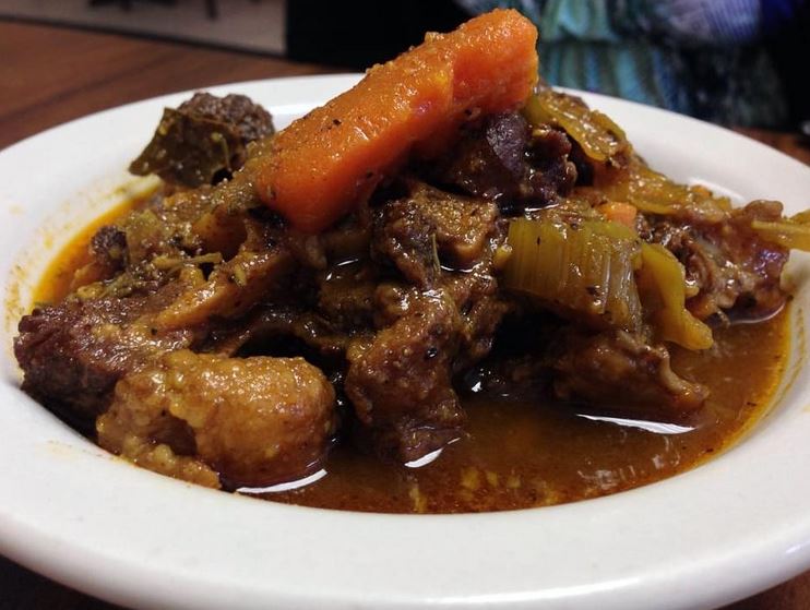 Order Stew Oxtails Plus 1 Side food online from Garifuna Flava store, Chicago on bringmethat.com