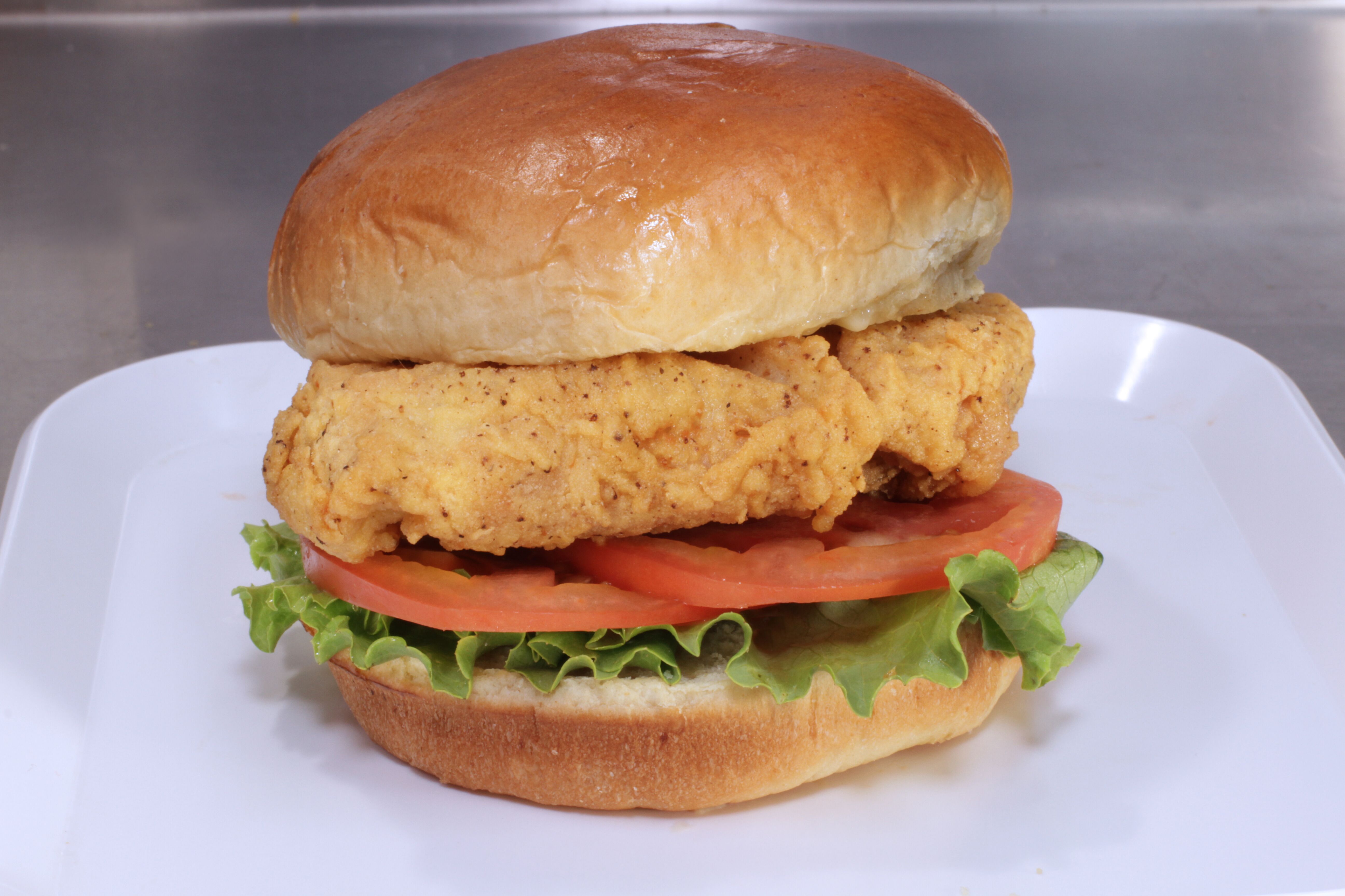 Order Chicken Sandwich food online from Red Rooster store, Chicago on bringmethat.com