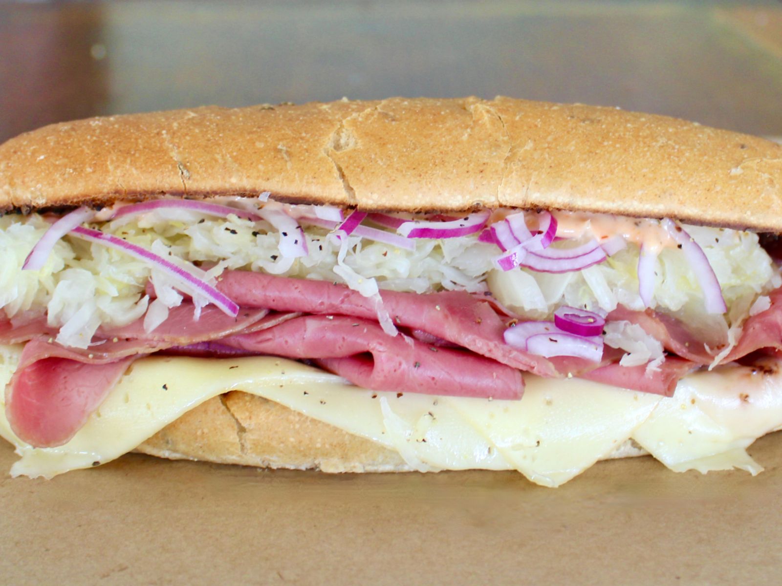 Order Reuben on Rye food online from The Great Outdoors Sub Shop store, Fort Worth on bringmethat.com