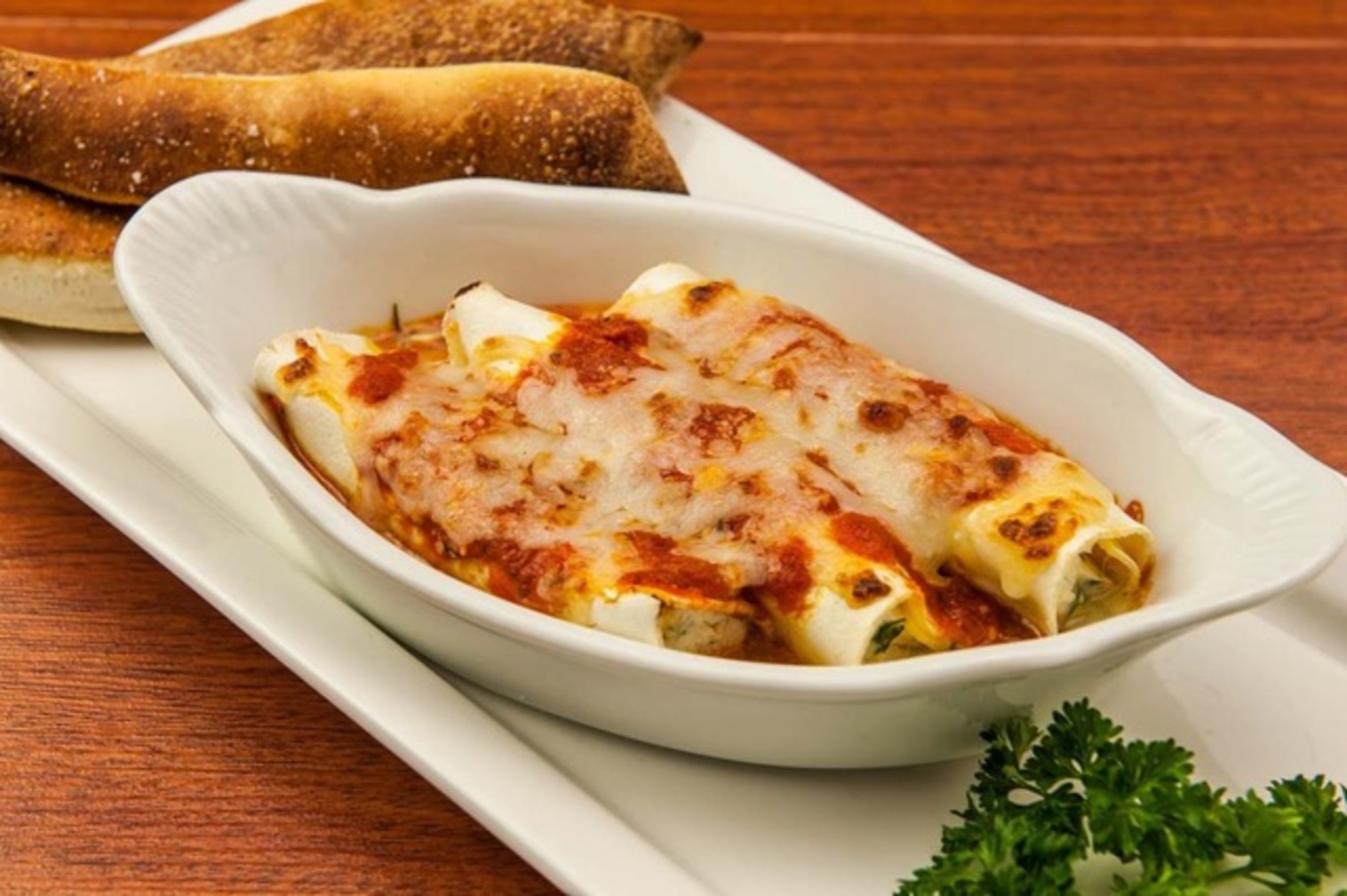 Order Manicotti food online from Stone Hot Pizza store, Alexandria on bringmethat.com
