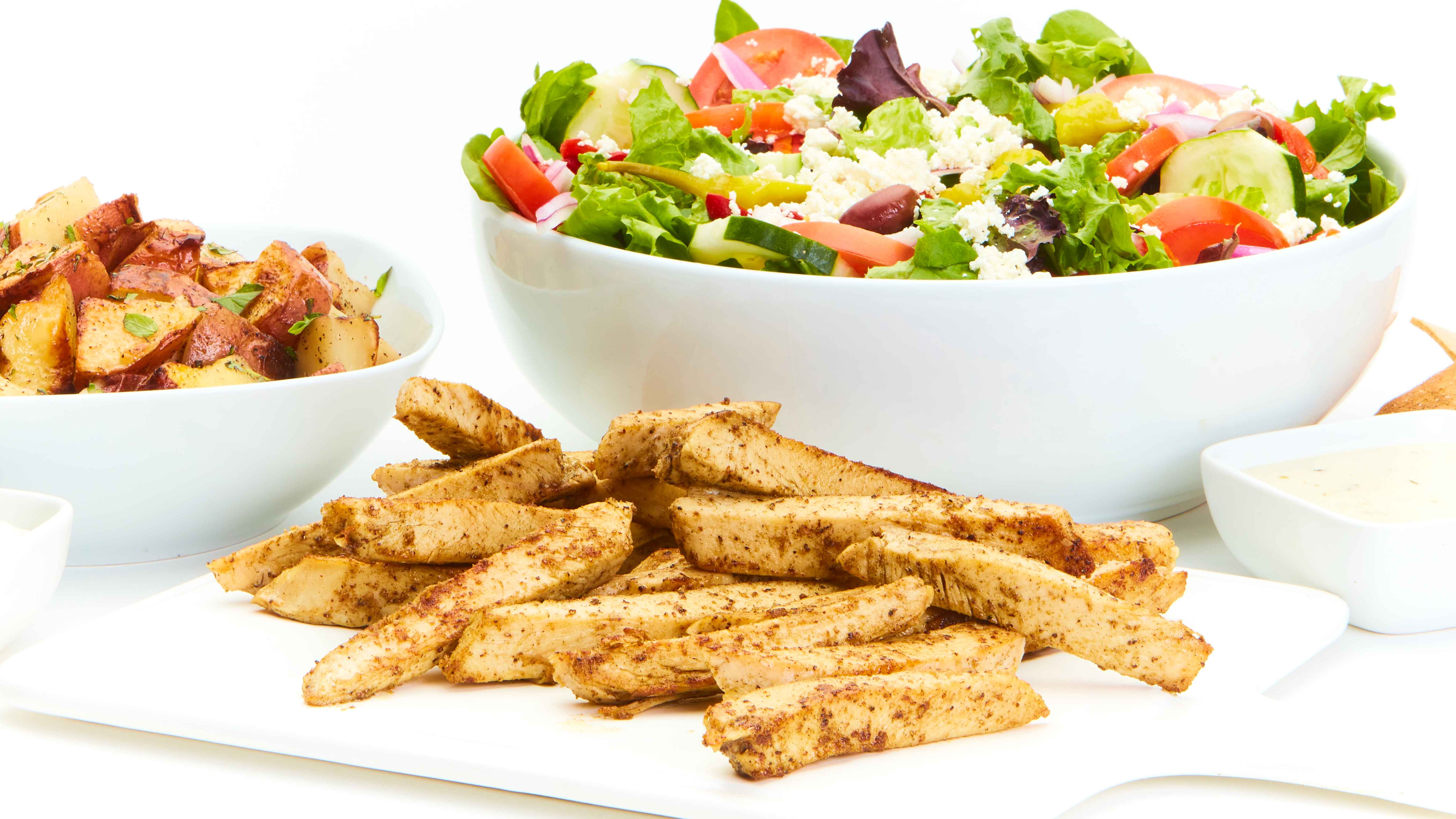 Order Grilled Chicken Feast for 4 food online from Taziki's Mediterranean Cafe store, Charlotte on bringmethat.com