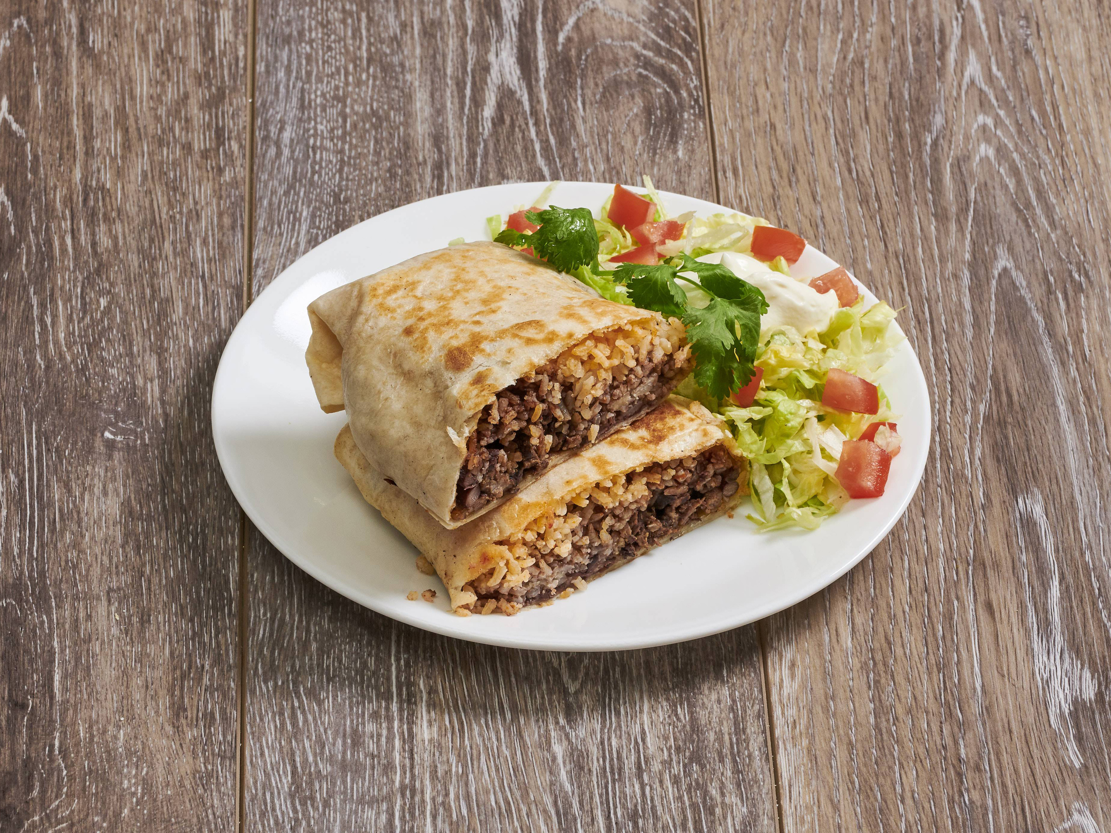 Order Bistec Burrito food online from La Comadre Restaurant And Bakery store, Woodhaven on bringmethat.com