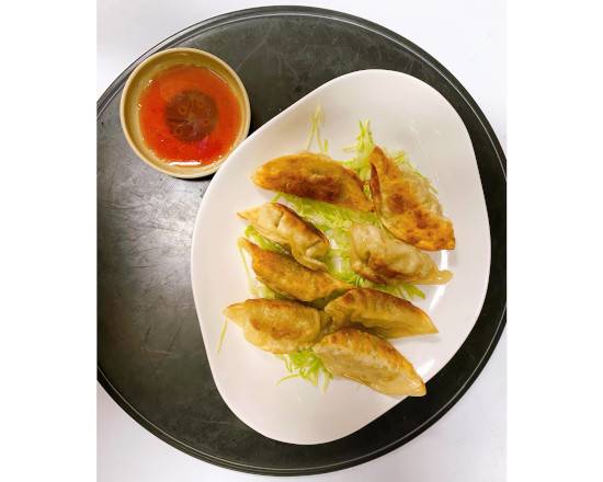 Order Pan Fried Pot Stickers（8 pieces) 生煎鍋貼（8隻） food online from B&W Kitchen store, San Francisco on bringmethat.com
