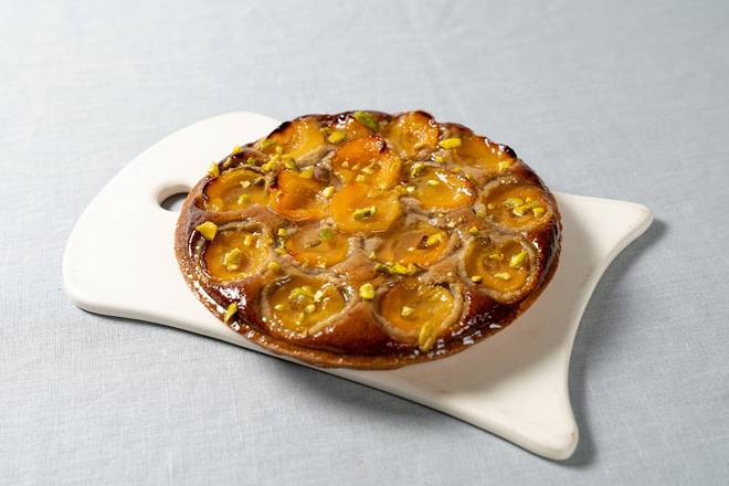 Order Apricot Pistachio Tart Large food online from Le Pain Quotidien store, Greenwich on bringmethat.com