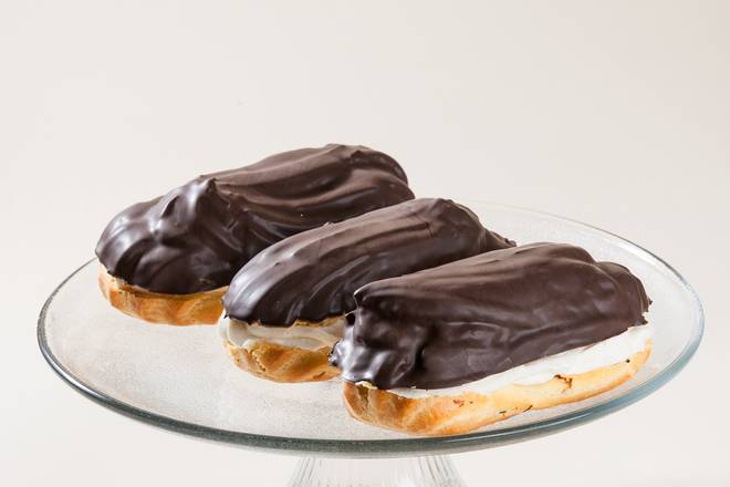 Order Chocolate Eclair + Choice of Beverages food online from Lutz Cafe & Pastry Shop store, CHICAGO on bringmethat.com
