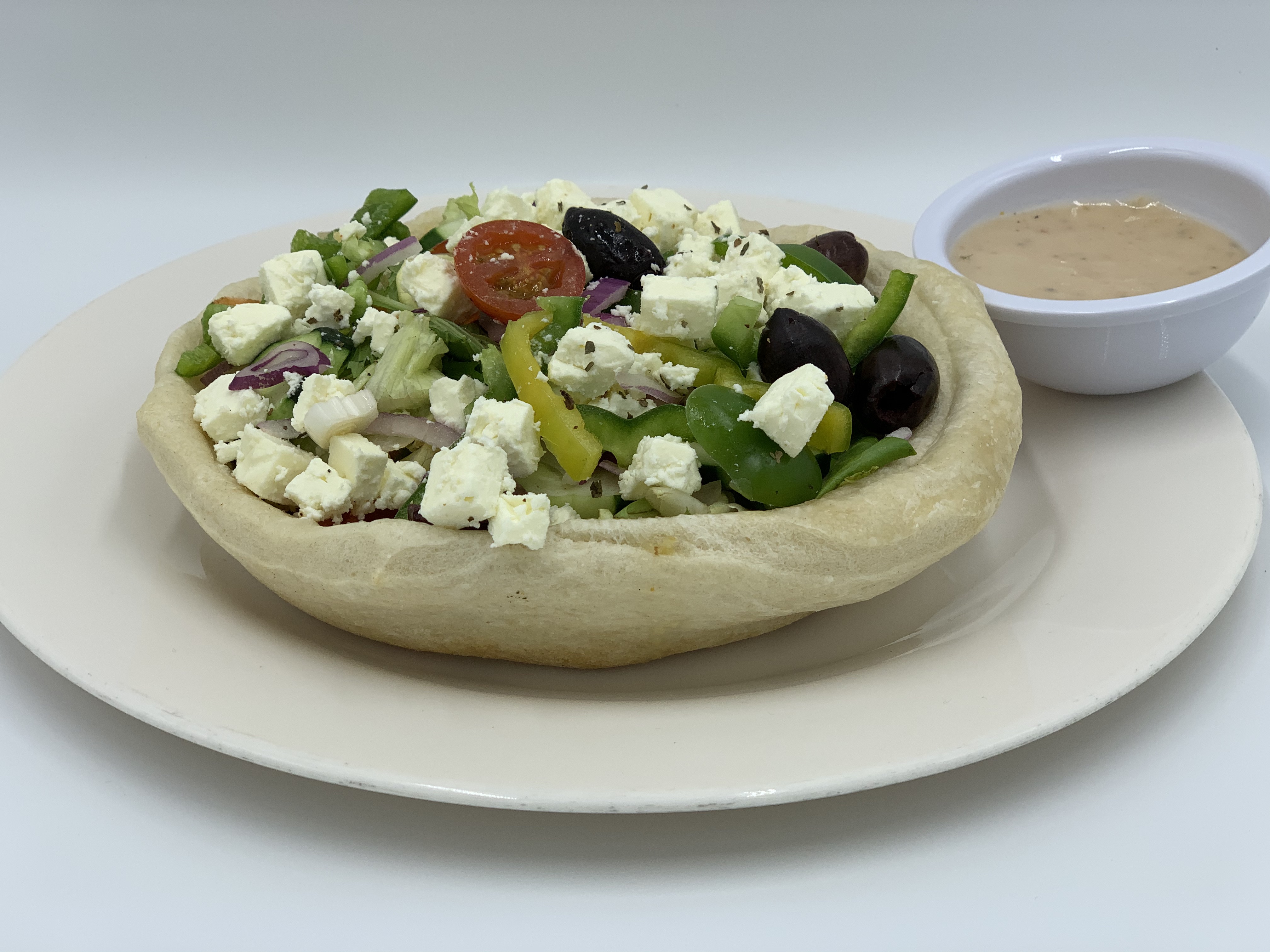 Order Greek Salad Bread Bowl food online from Mario's Pizzeria of Seaford store, Seaford on bringmethat.com