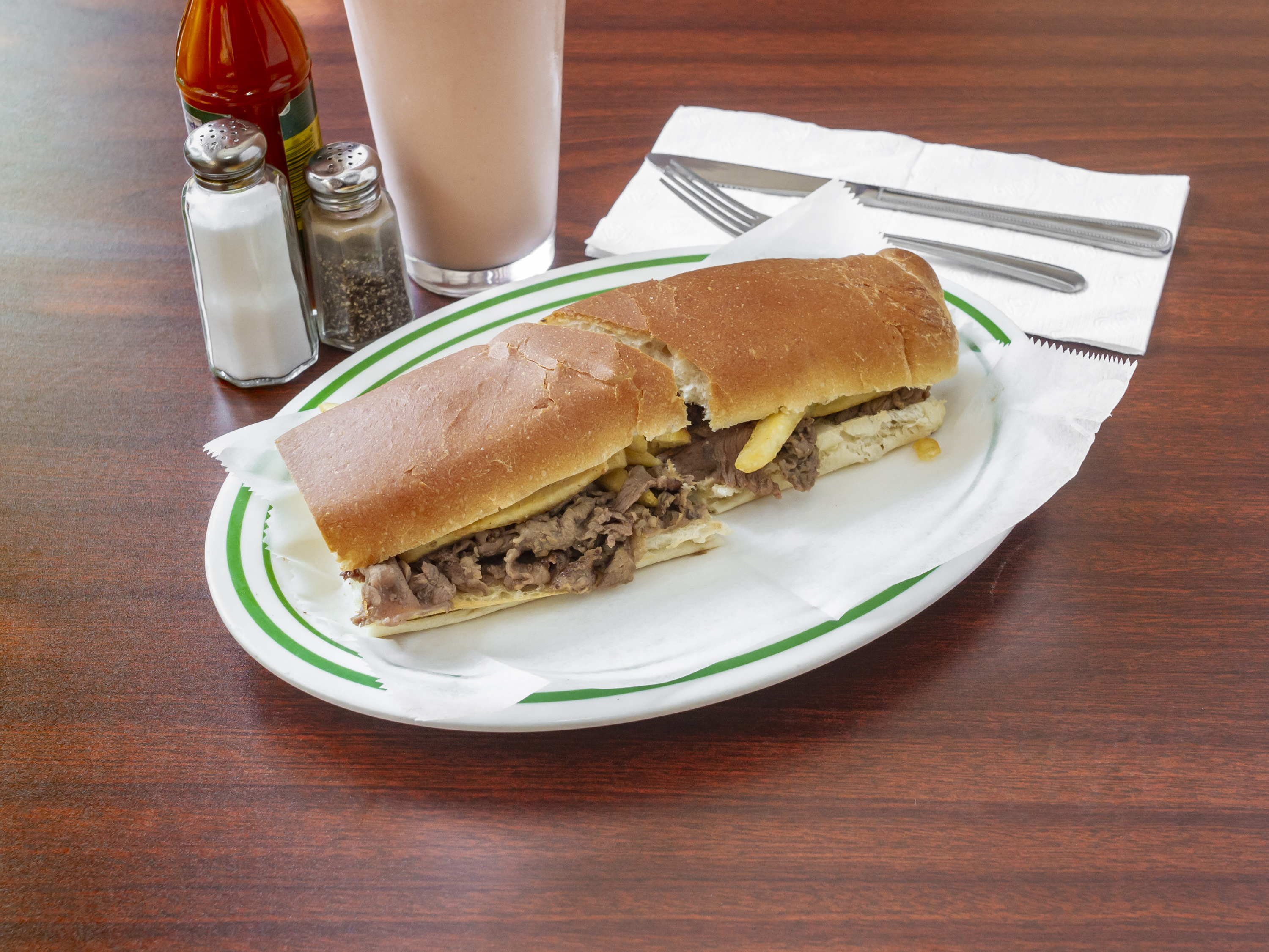 Order Pan con Bistec Regular Sandwich food online from La Churreria store, Union City on bringmethat.com