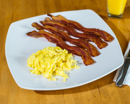 Order 2 Eggs with thick Hickory Smoked Bacon food online from Apple Villa Pancake House store, Batavia on bringmethat.com