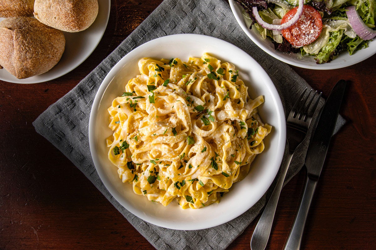 Order Fettuccine Alfredo food online from Bertucci's store, Plymouth Meeting on bringmethat.com