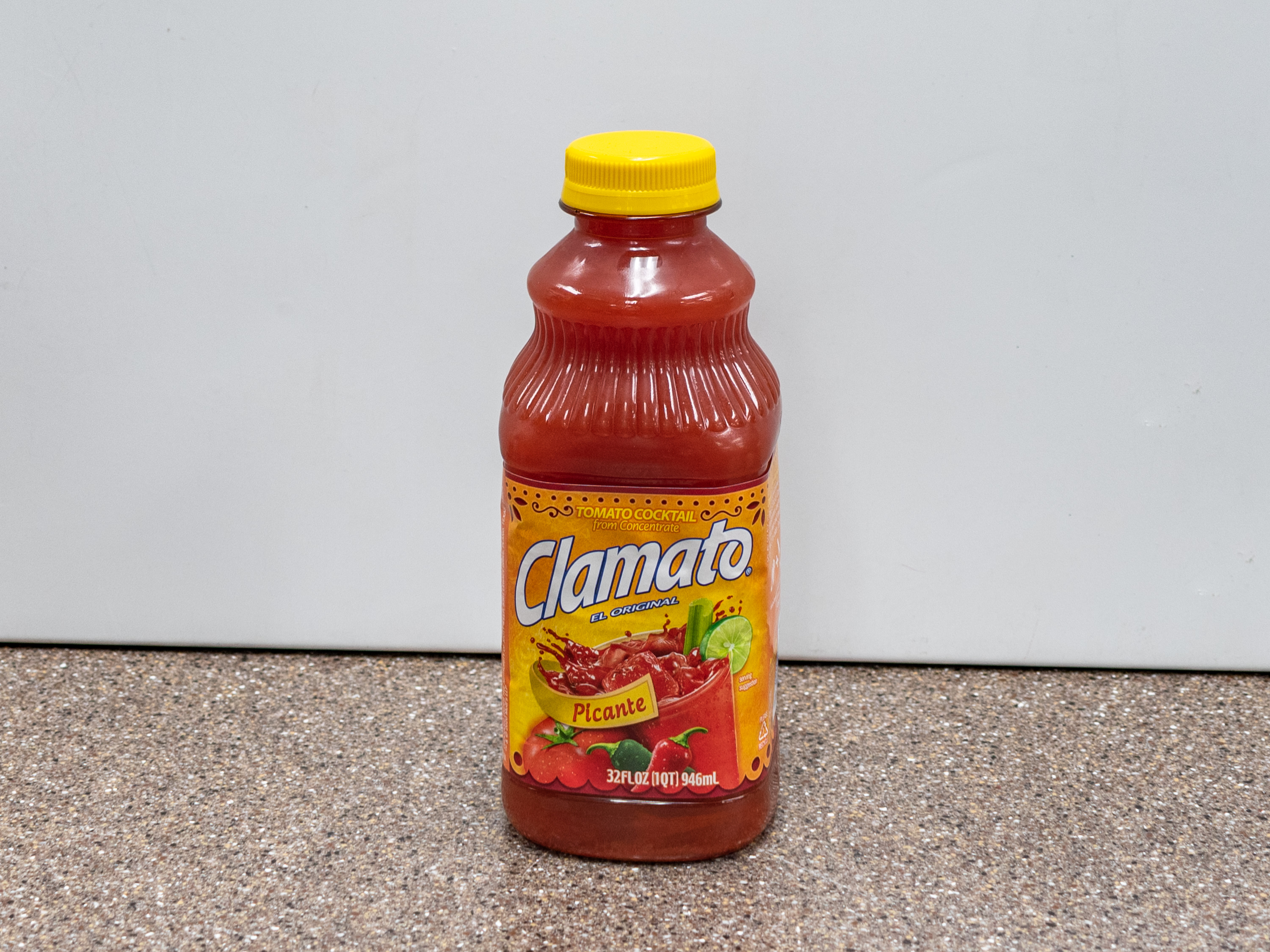 Order Clamato Picante 32 oz. food online from Kangaroo Food Mart store, Cathedral City on bringmethat.com