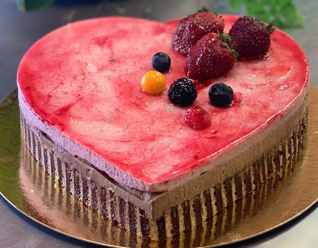 Order Raspberry Cake food online from Palace Bakery store, Laguna Hills on bringmethat.com