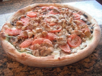 Order 9. Deluxe Chicken Pesto Pizza food online from Zorbas Pizza store, Millbrae on bringmethat.com