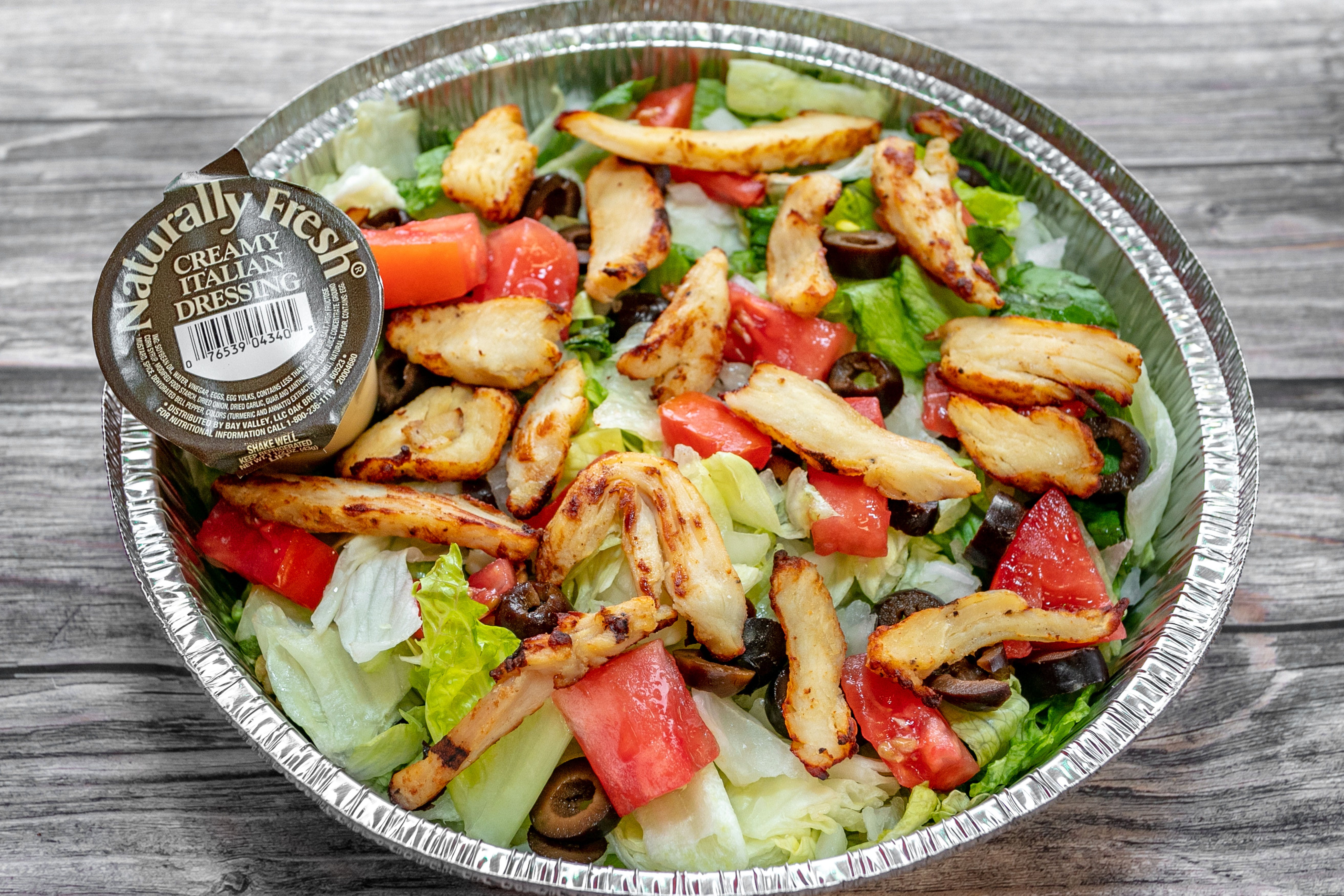 Order Grilled Chicken Salad - Large food online from Pizza Place store, Adairsville on bringmethat.com