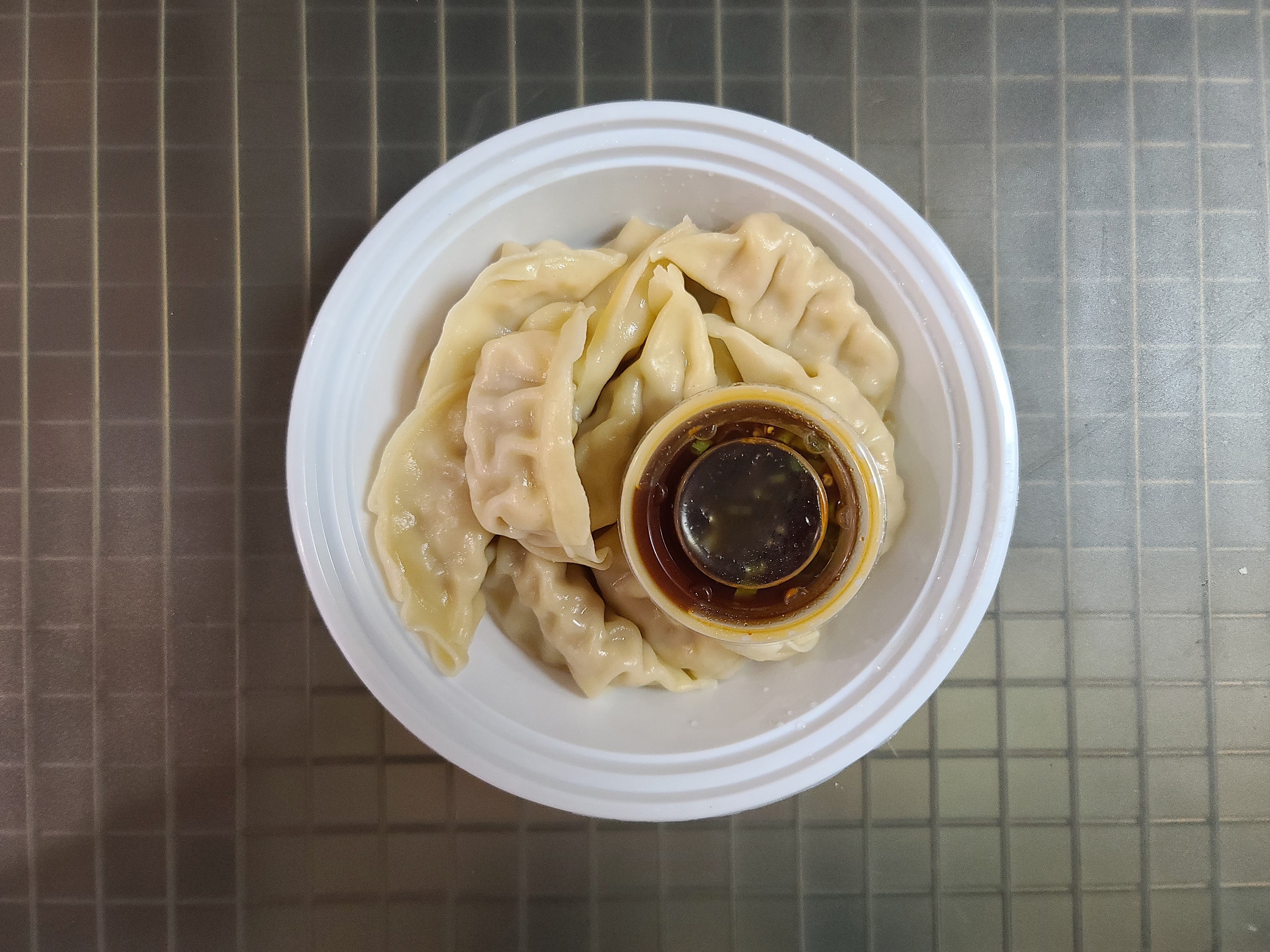 Order Steamed Dumplings  (10 pcs) food online from China King store, Florissant on bringmethat.com