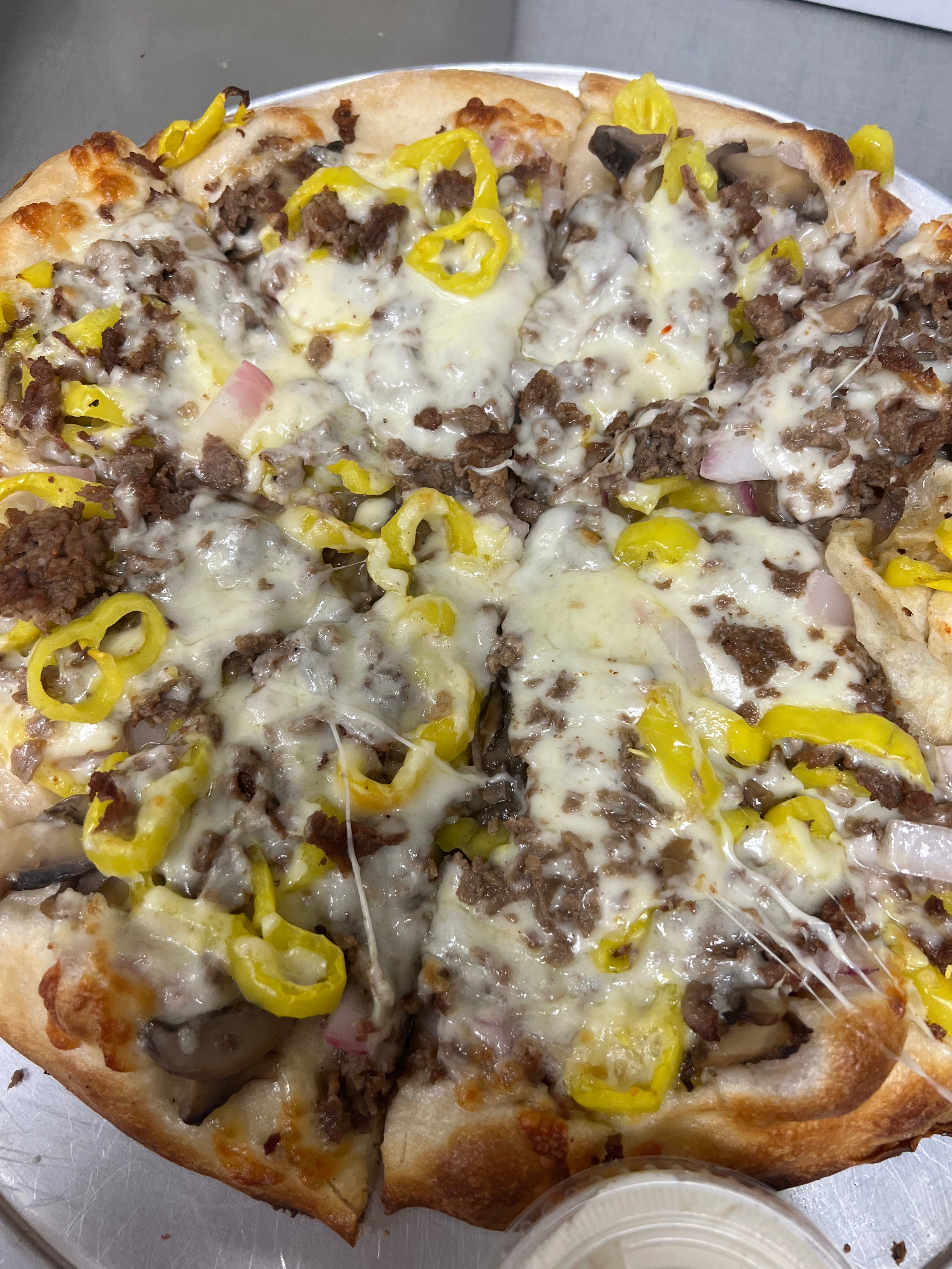 Order Philly Steak & Cheese Pizza - Personal food online from Pizza Mia store, Grand Blanc on bringmethat.com