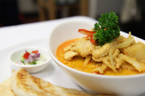 Order Chicken Yellow Curry with Thai Roti food online from Bangkok Cuisine store, Forest Hills on bringmethat.com