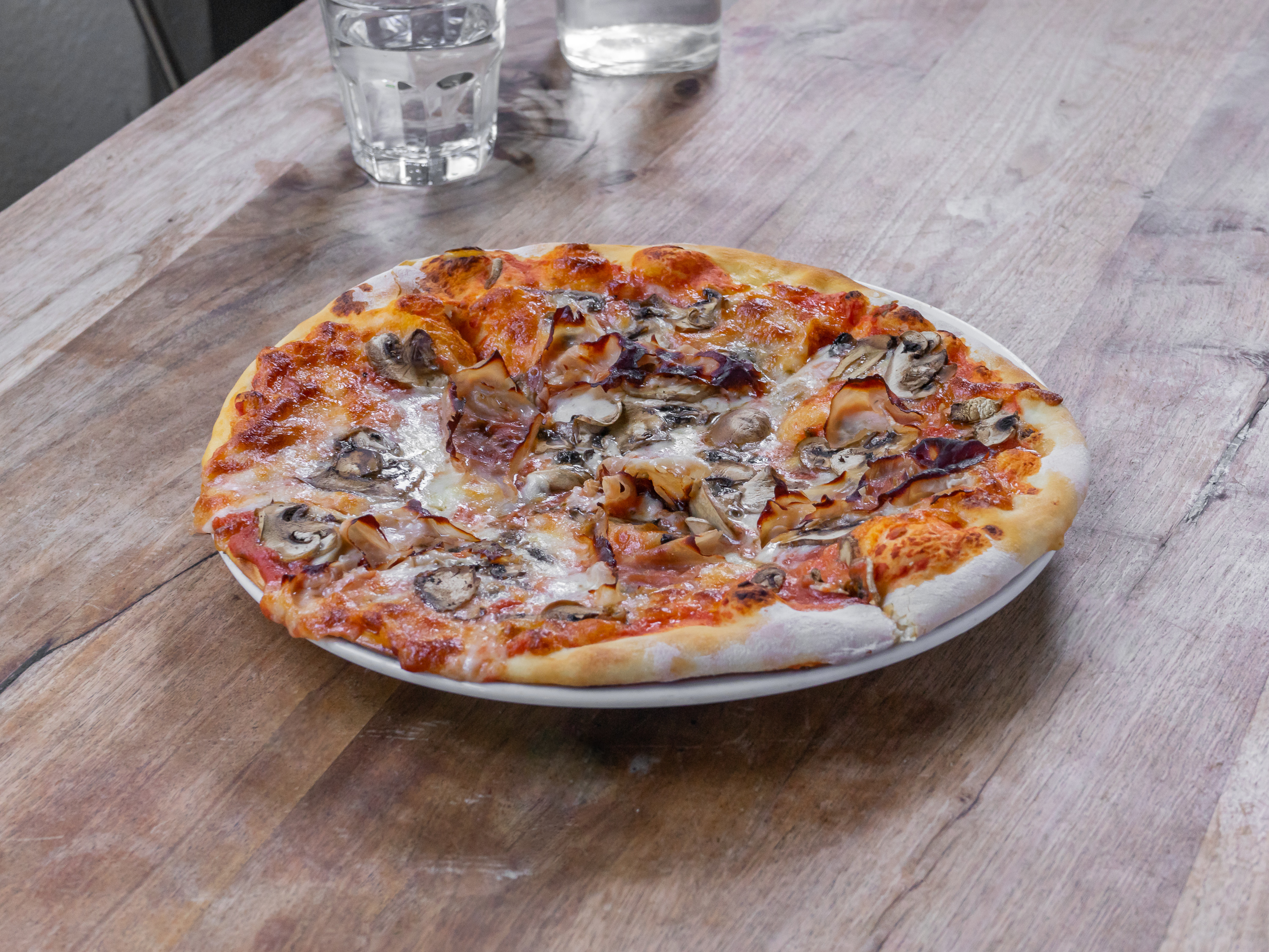 Order Funghi e Salsiccia Pizza food online from Pazzia Restaurant & Pizzeria store, San Francisco on bringmethat.com