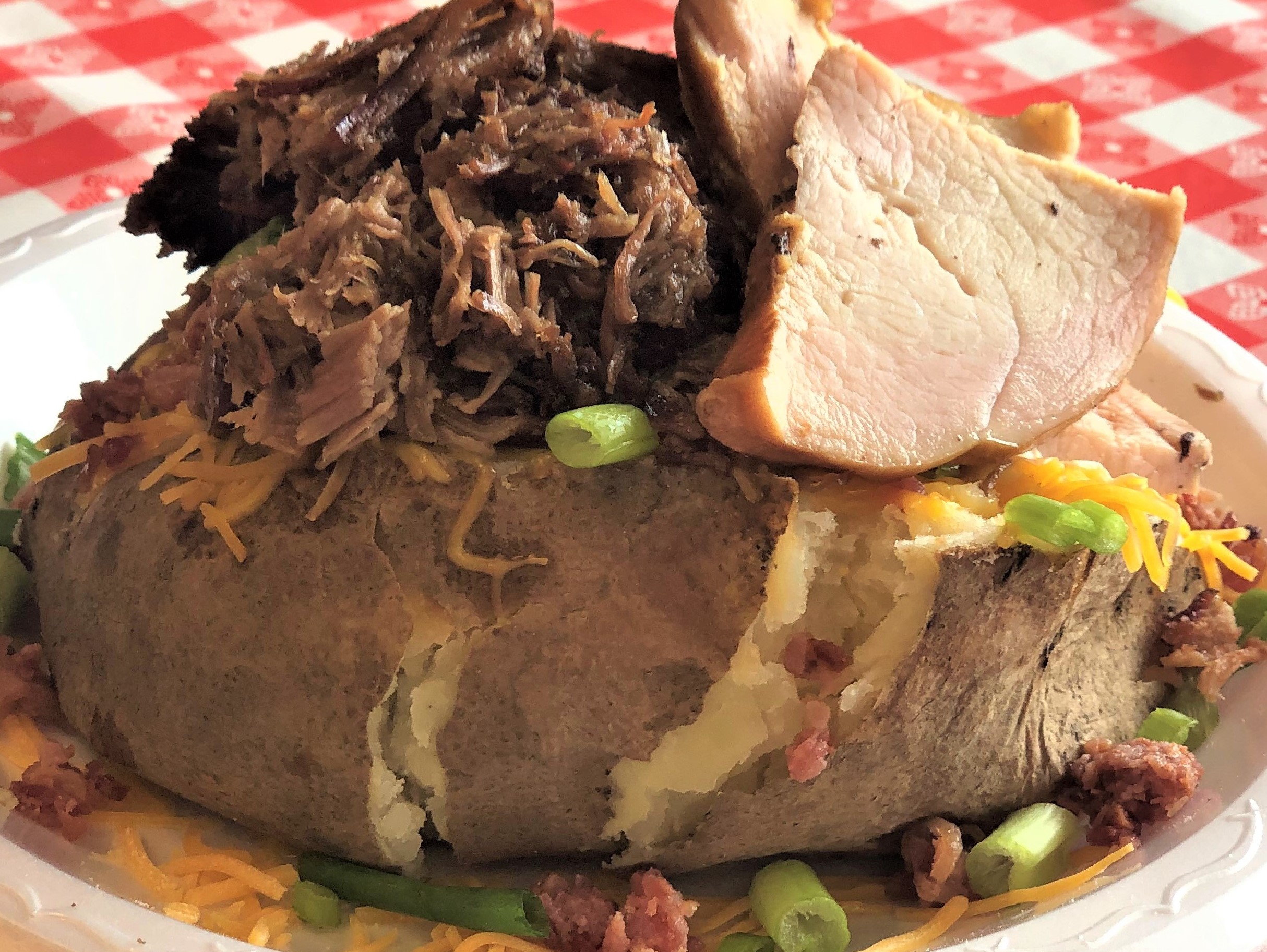 Order Loaded Tater with Double Meat food online from Hog Wild Pit Bar-B-Q store, Phoenix on bringmethat.com