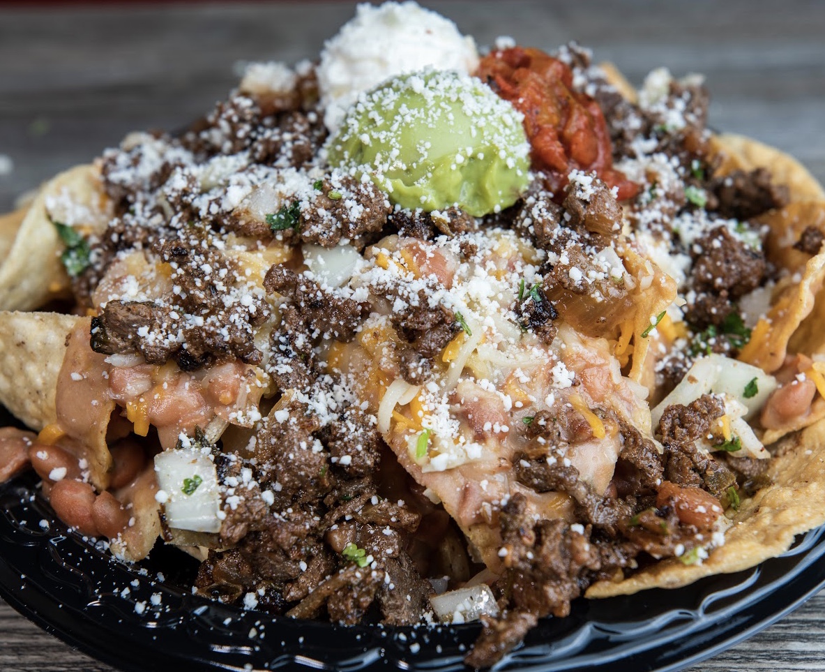 Order Nachos food online from The Forum Blues Cafe store, Rialto on bringmethat.com