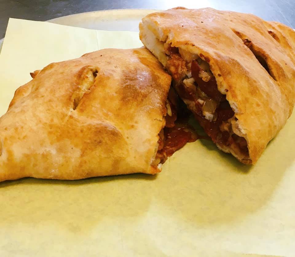 Order Big Calzone food online from Wild Pepper Pizza store, Salt Lake City on bringmethat.com