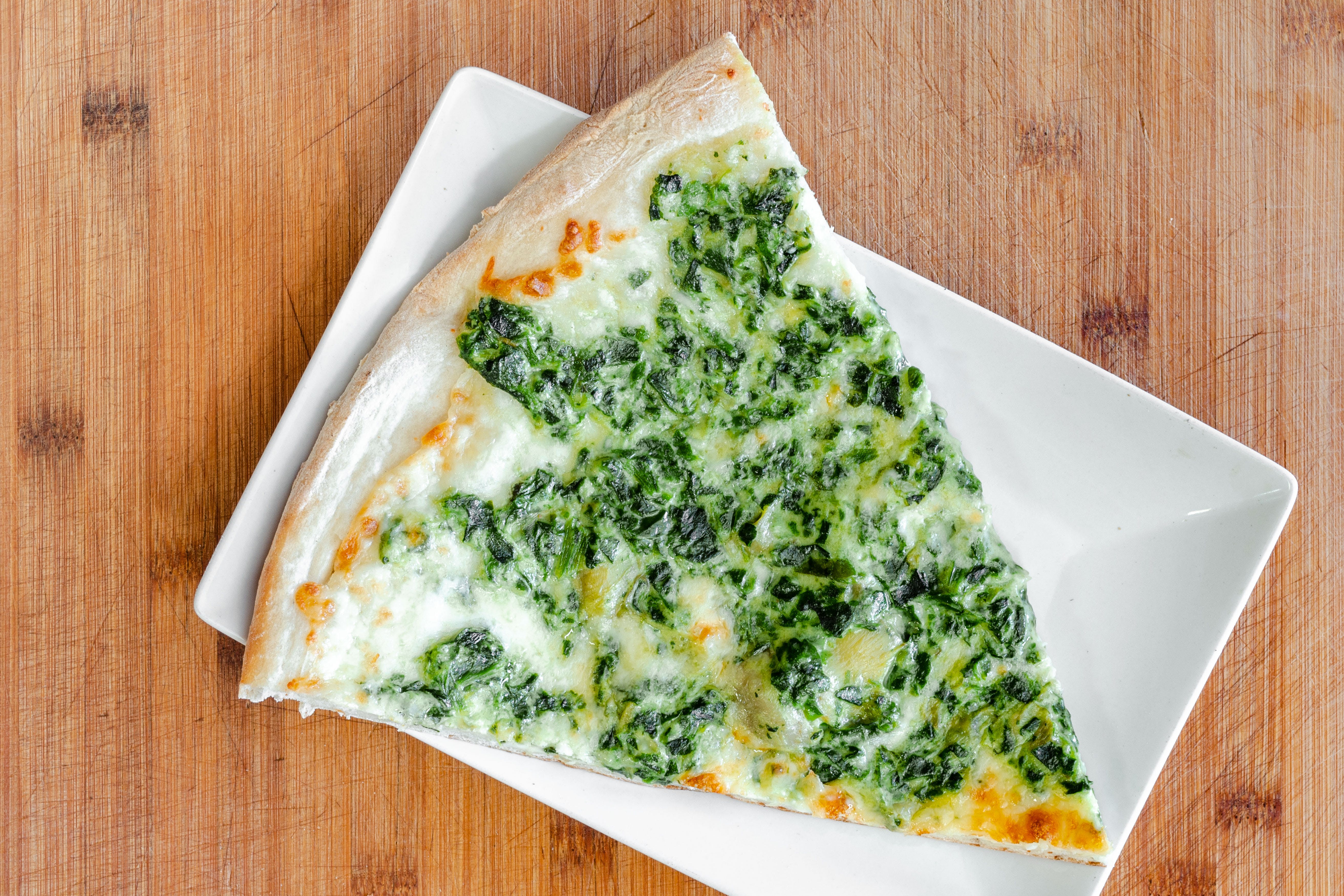Order Spinach Artichoke Pizza - SMALL 14” food online from Maria's store, Yorktown Heights on bringmethat.com