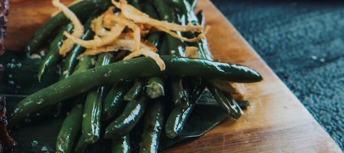 Order Sautéed Green Beans food online from Kona Grill store, Omaha on bringmethat.com
