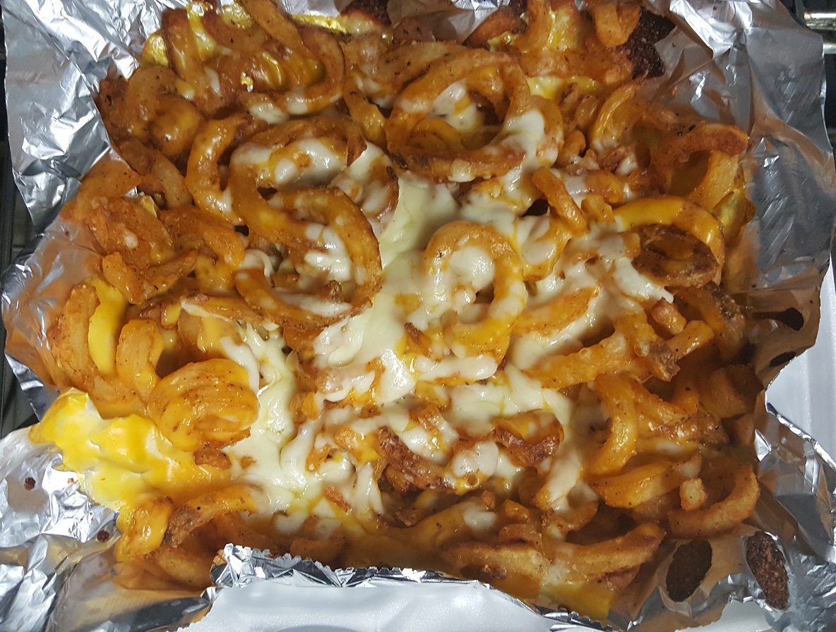 Order Super-Size Cheese Fries food online from Gumby's Pizza store, Raleigh on bringmethat.com