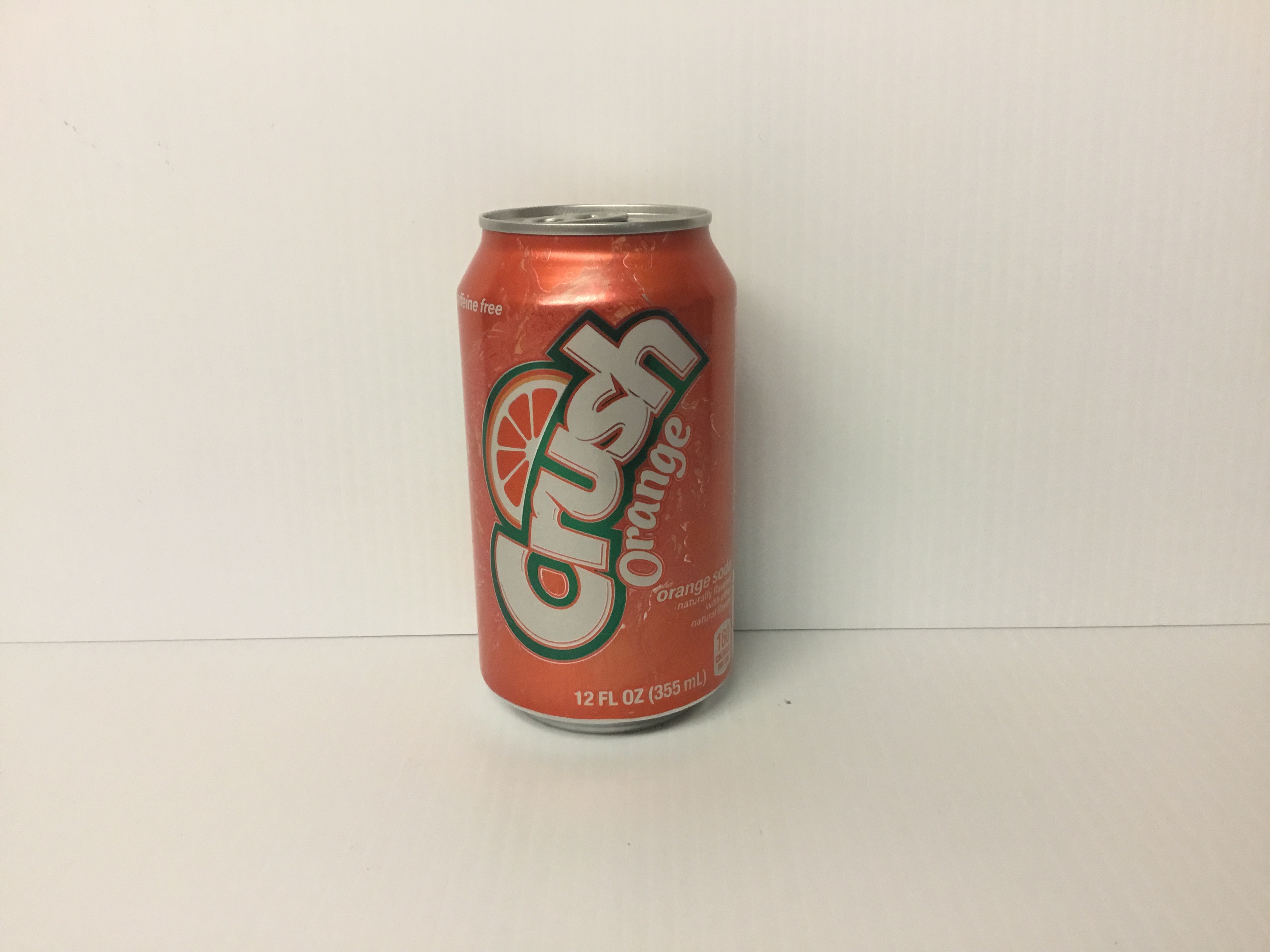 Order Crush Orange (can) 12 oz food online from Just Dash It store, Englewood on bringmethat.com