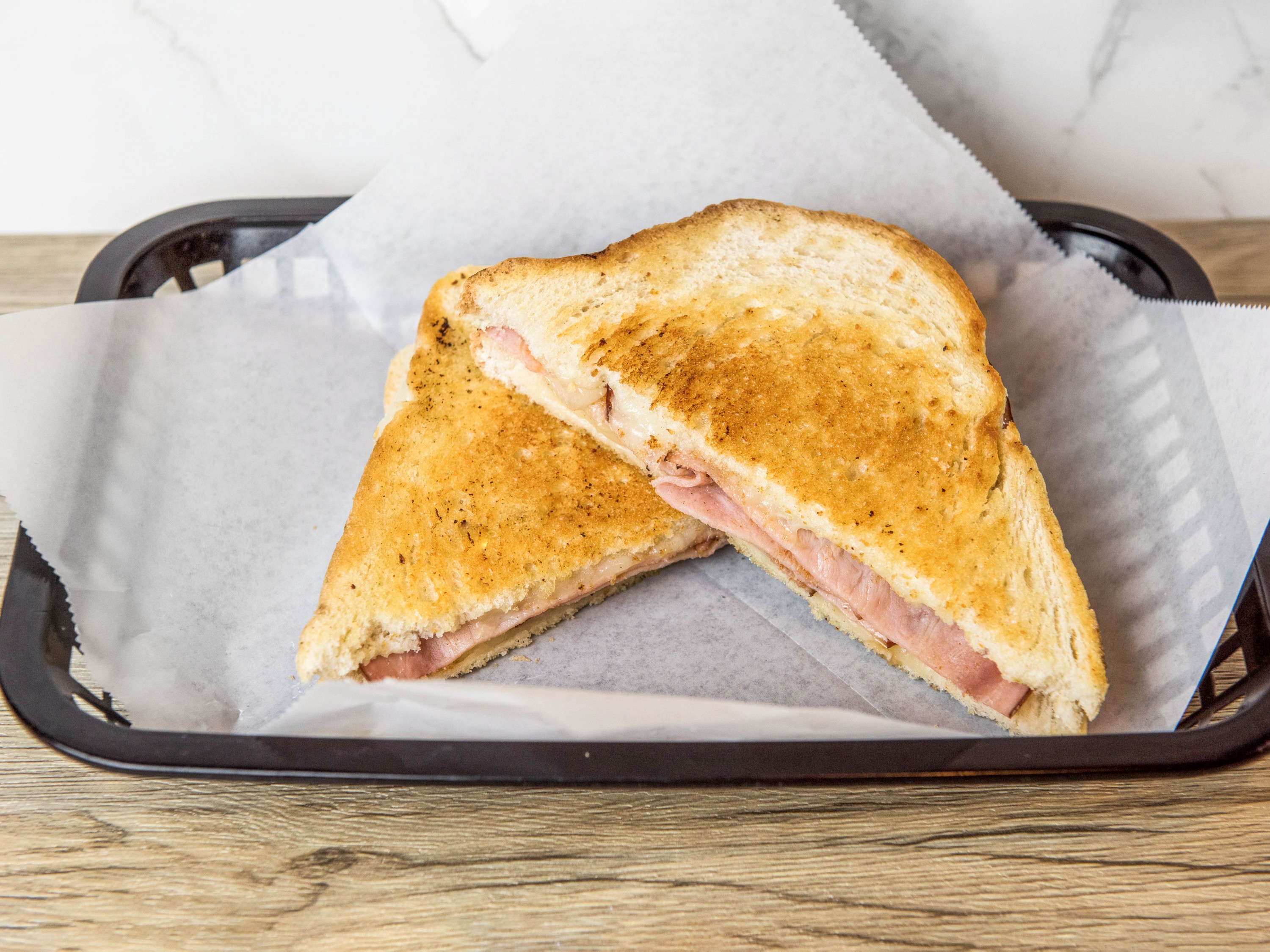 Order Grilled Ham and Cheese Sandwich food online from Mustard Seed Cafe store, Seattle on bringmethat.com