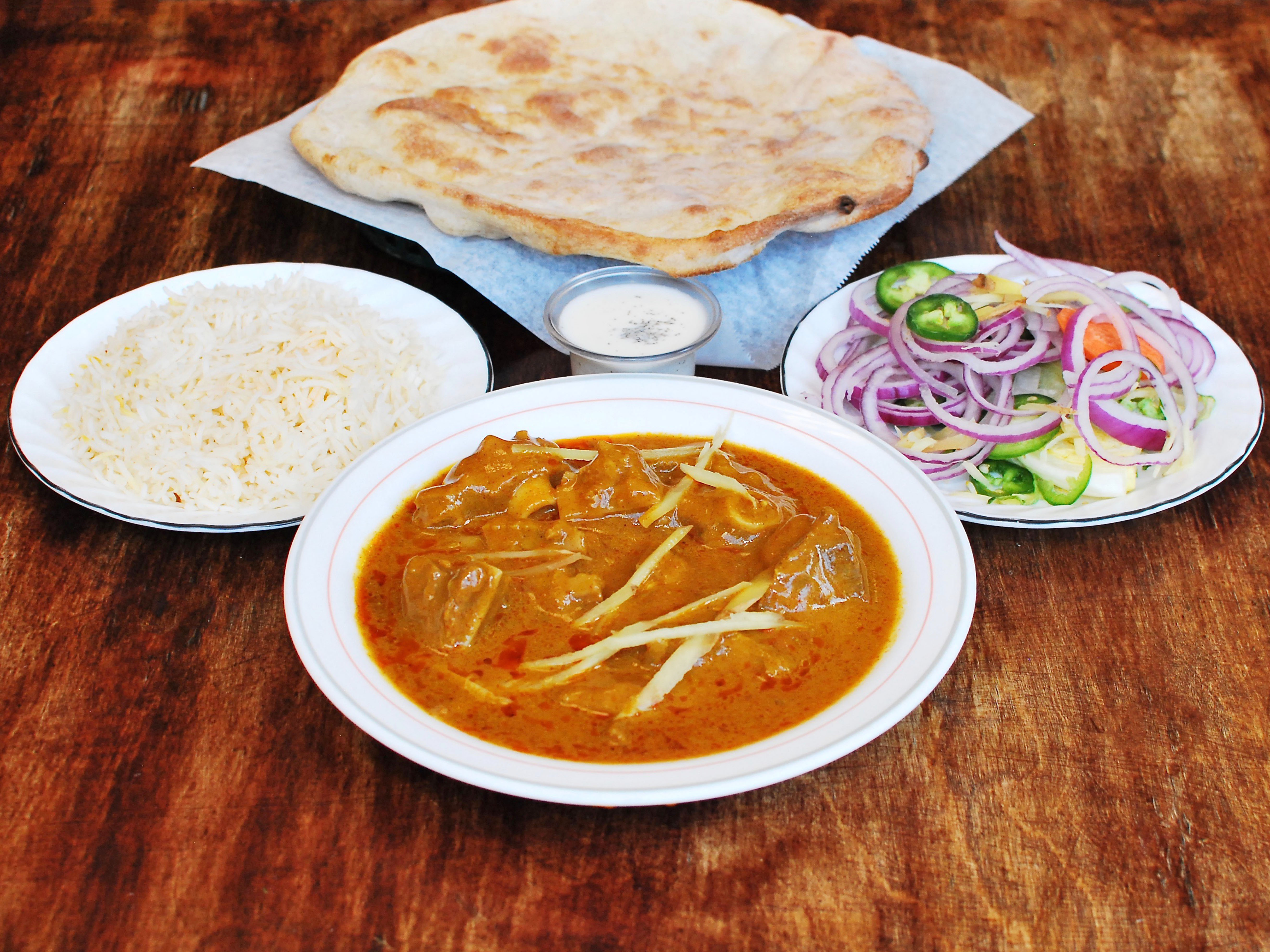 Order Mutton Masala food online from Halal Pita Grill store, Chicago on bringmethat.com