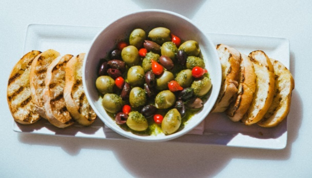 Order Marinated Olives food online from City Lights Rooftop store, Charlotte on bringmethat.com