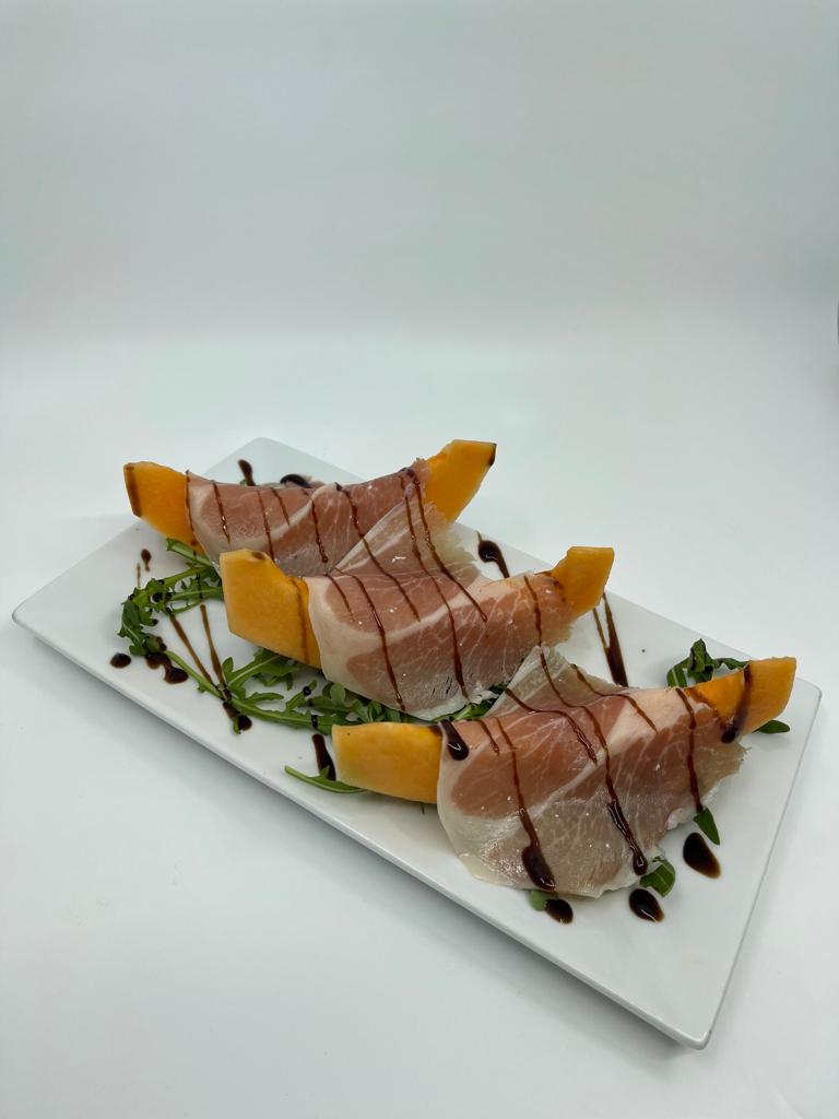 Order Prosciutto and Melon  food online from Carmine's Italian Cuisine store, Salt Lake City on bringmethat.com