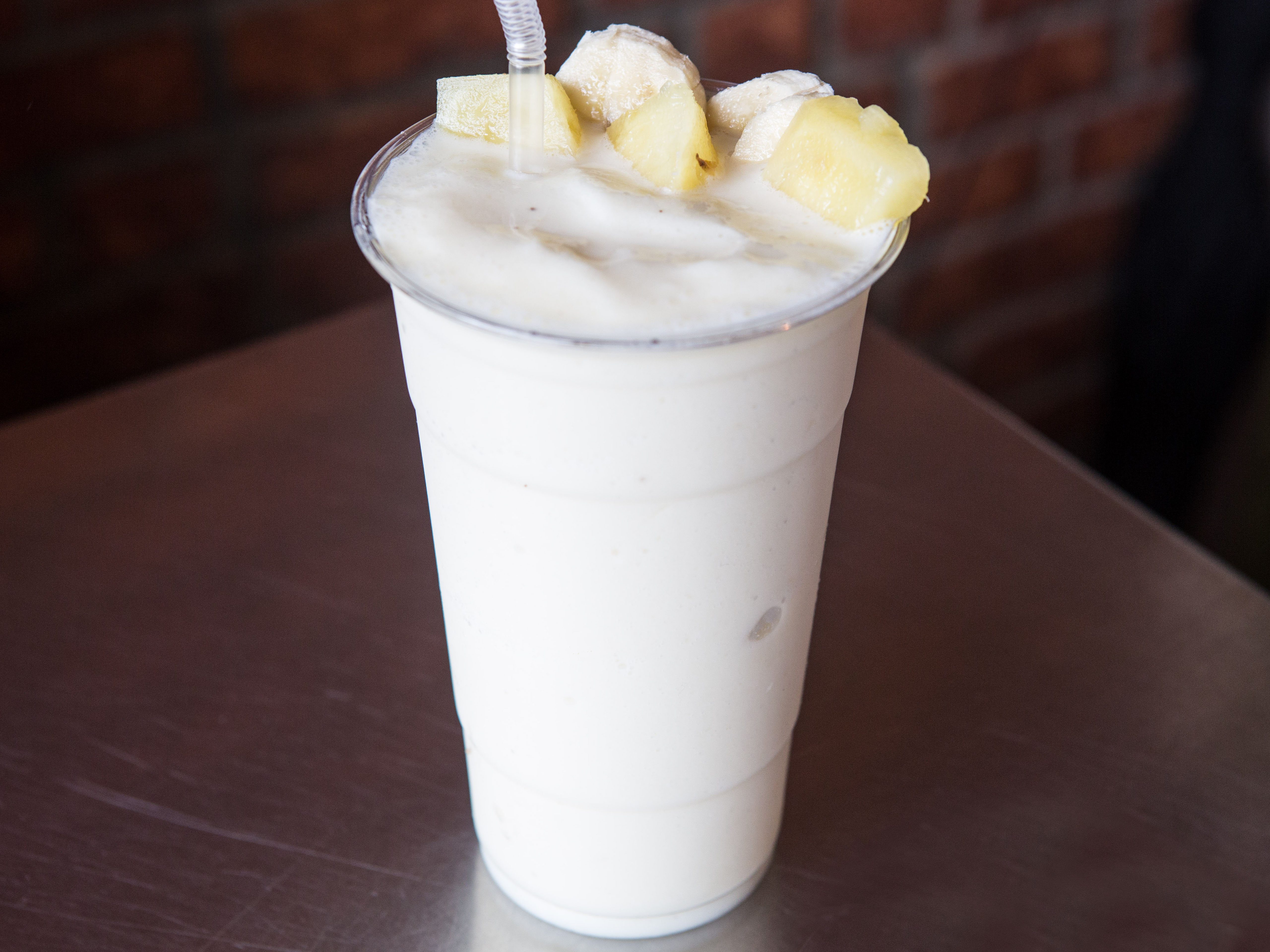 Order Pineapple and Banana Smoothie food online from Bagels by the park store, Brooklyn on bringmethat.com