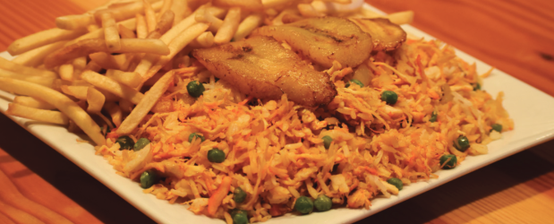 Order Arroz con Pollo food online from Arepas Paisas store, Dover on bringmethat.com