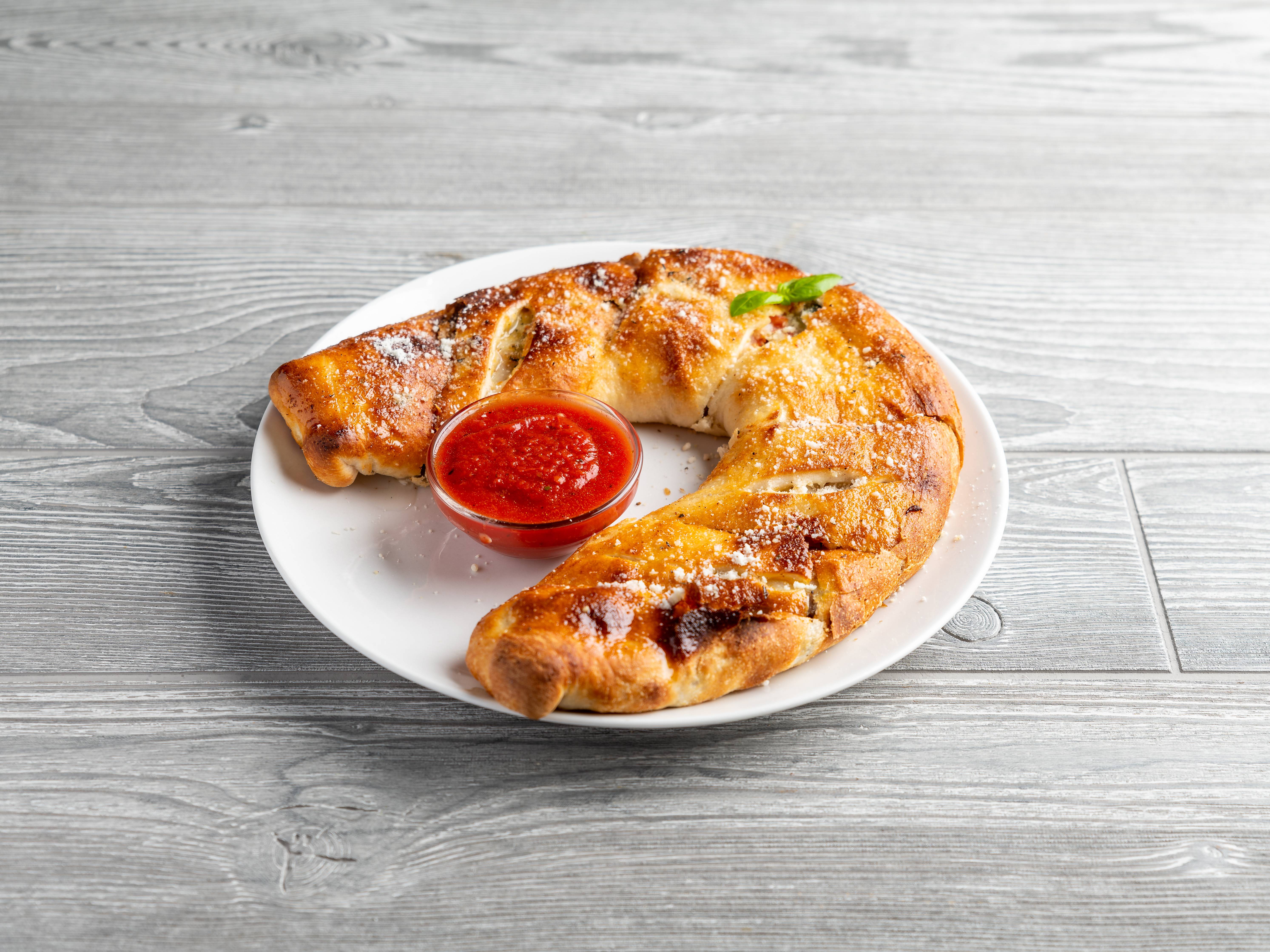 Order Supreme Calzone food online from Pizza Palace store, Oklahoma City on bringmethat.com