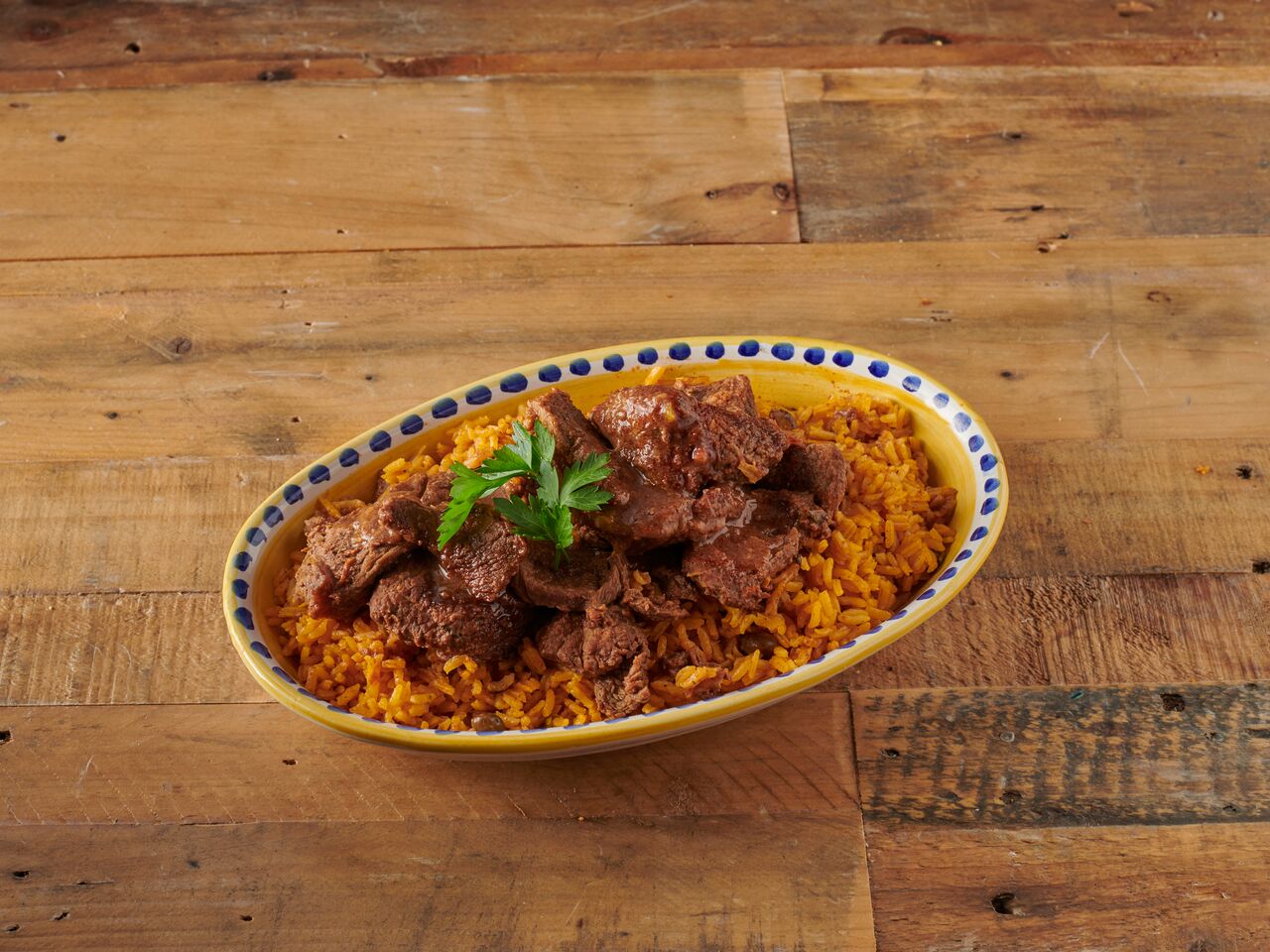 Order Rice and Stew Beef food online from Sazon Nunez store, Brooklyn on bringmethat.com