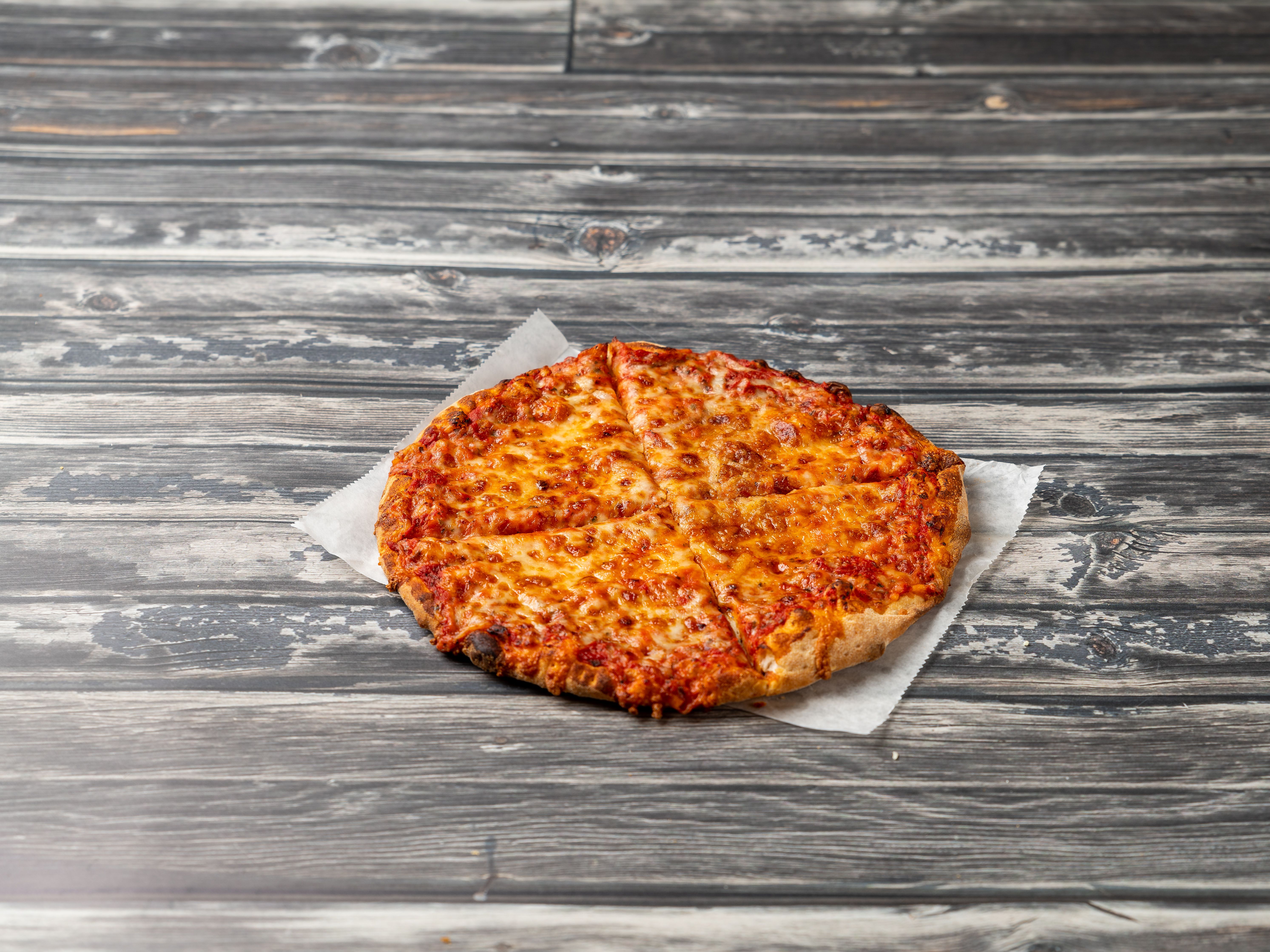 Order Traditional Round Pizza food online from Pastoli's Pizza store, Pittsburgh on bringmethat.com