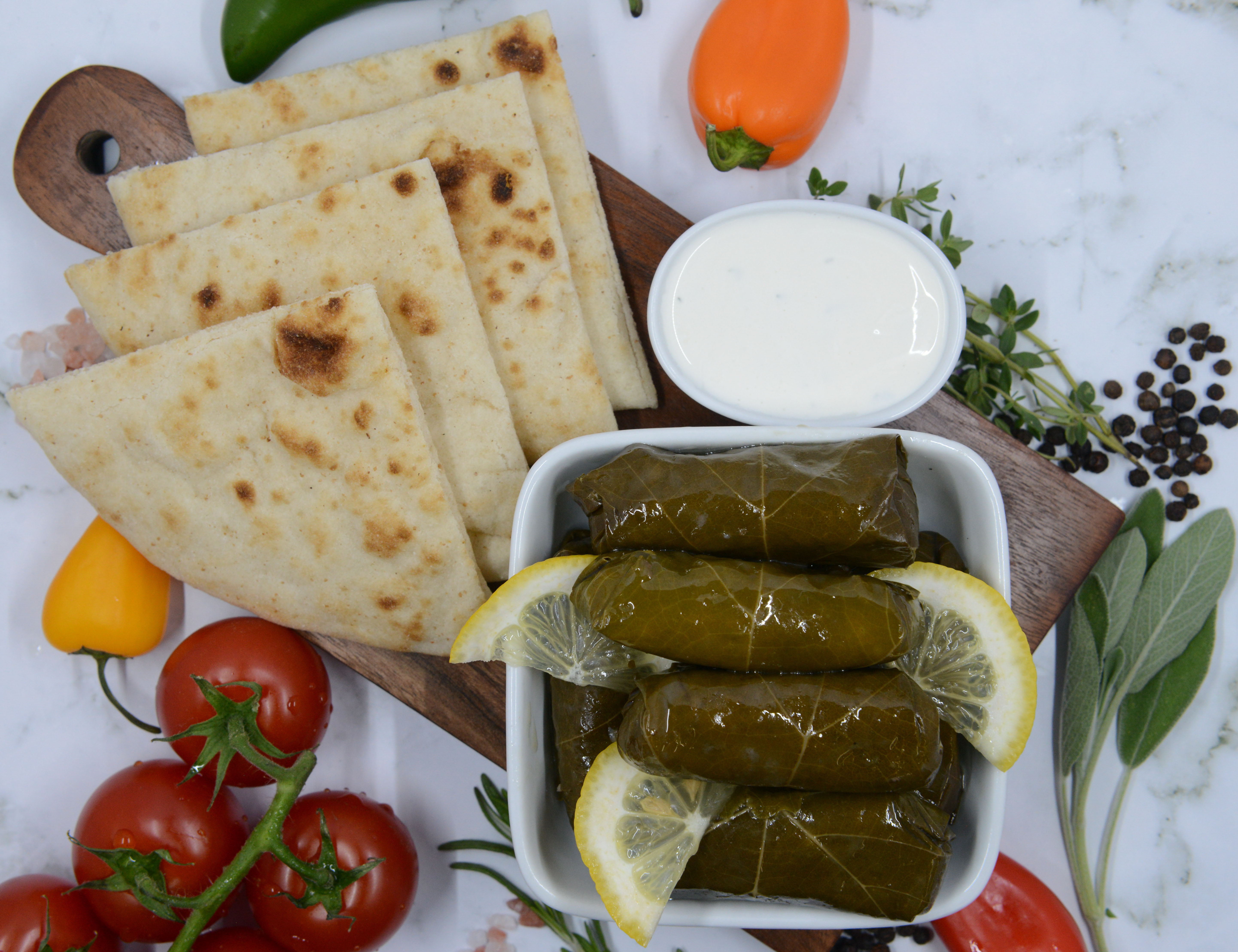 Order Stuffed Grape Leaves food online from Jeb Pizza store, Troy on bringmethat.com