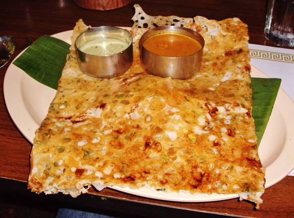 Order Cheddar Cheese and Fresh Tomato Rava Dosa  food online from Dosa Delight store, Jackson Heights on bringmethat.com
