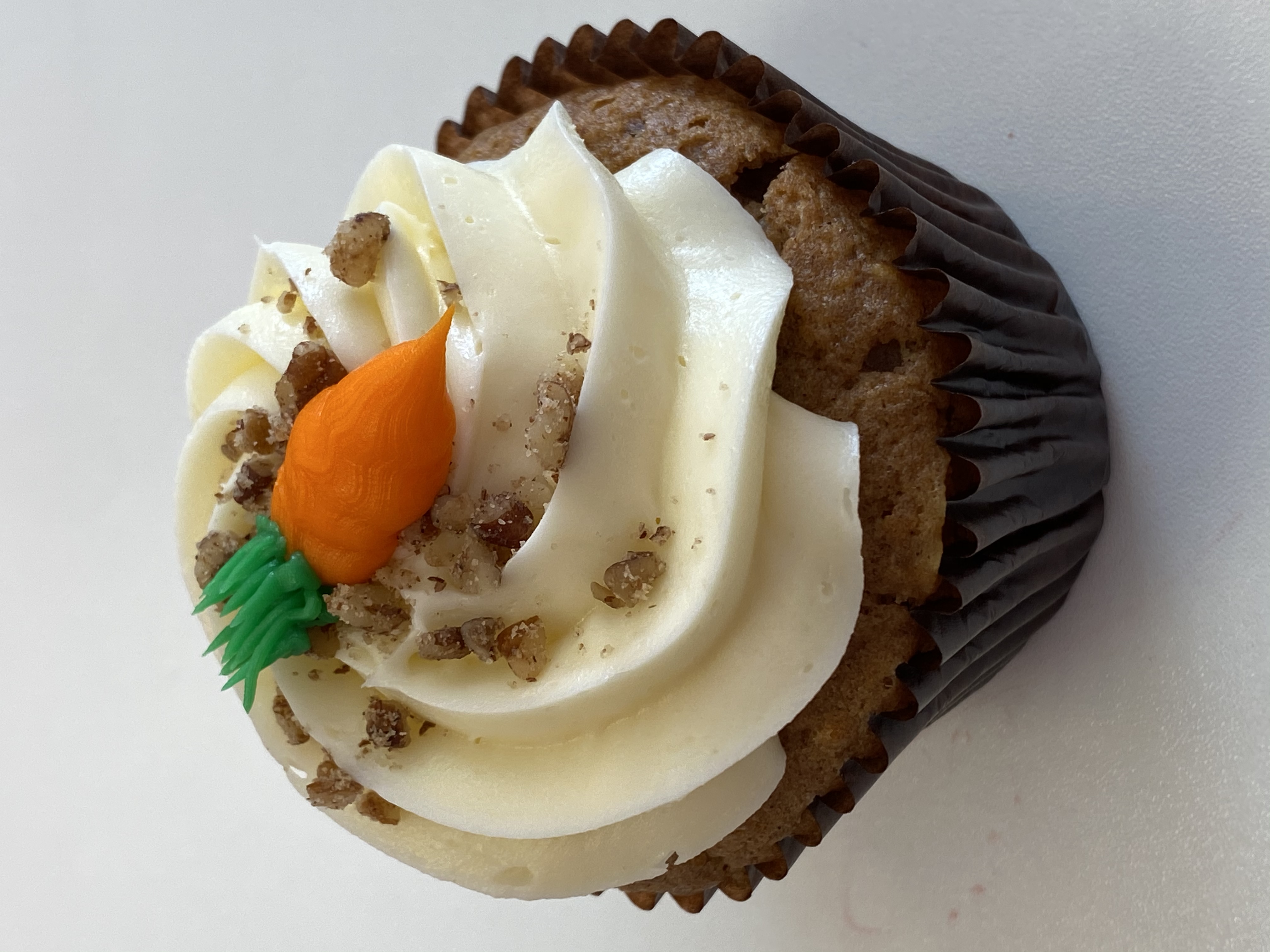 Order Carrot Cupcake food online from Smallcakes store, Richmond on bringmethat.com
