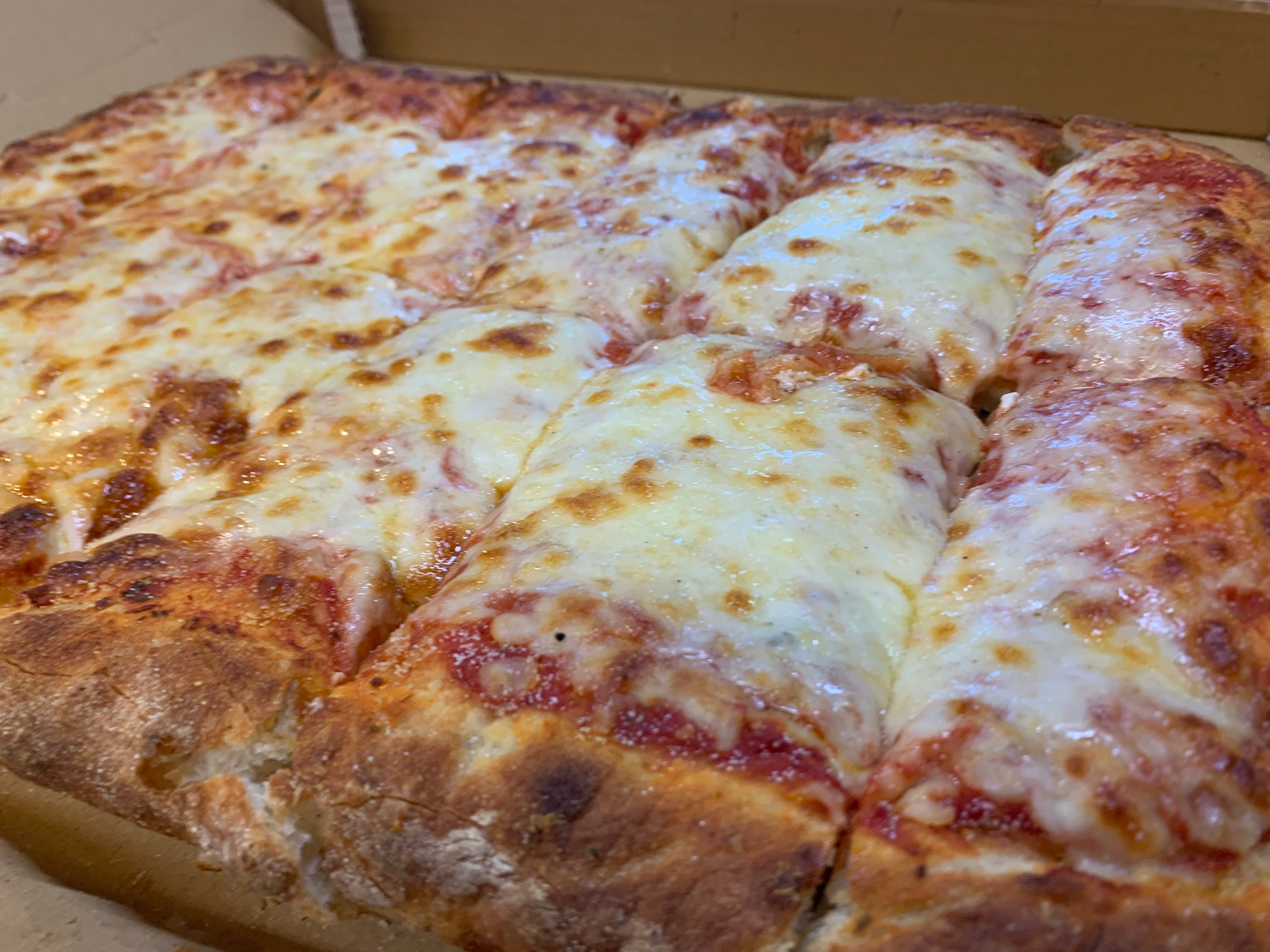 Order Traditional Sicilian Cheese Pizza - Thick crust Sicilian pan pizza 16” square pizza feeds 4 food online from Pizza By Rocco store, Natick on bringmethat.com
