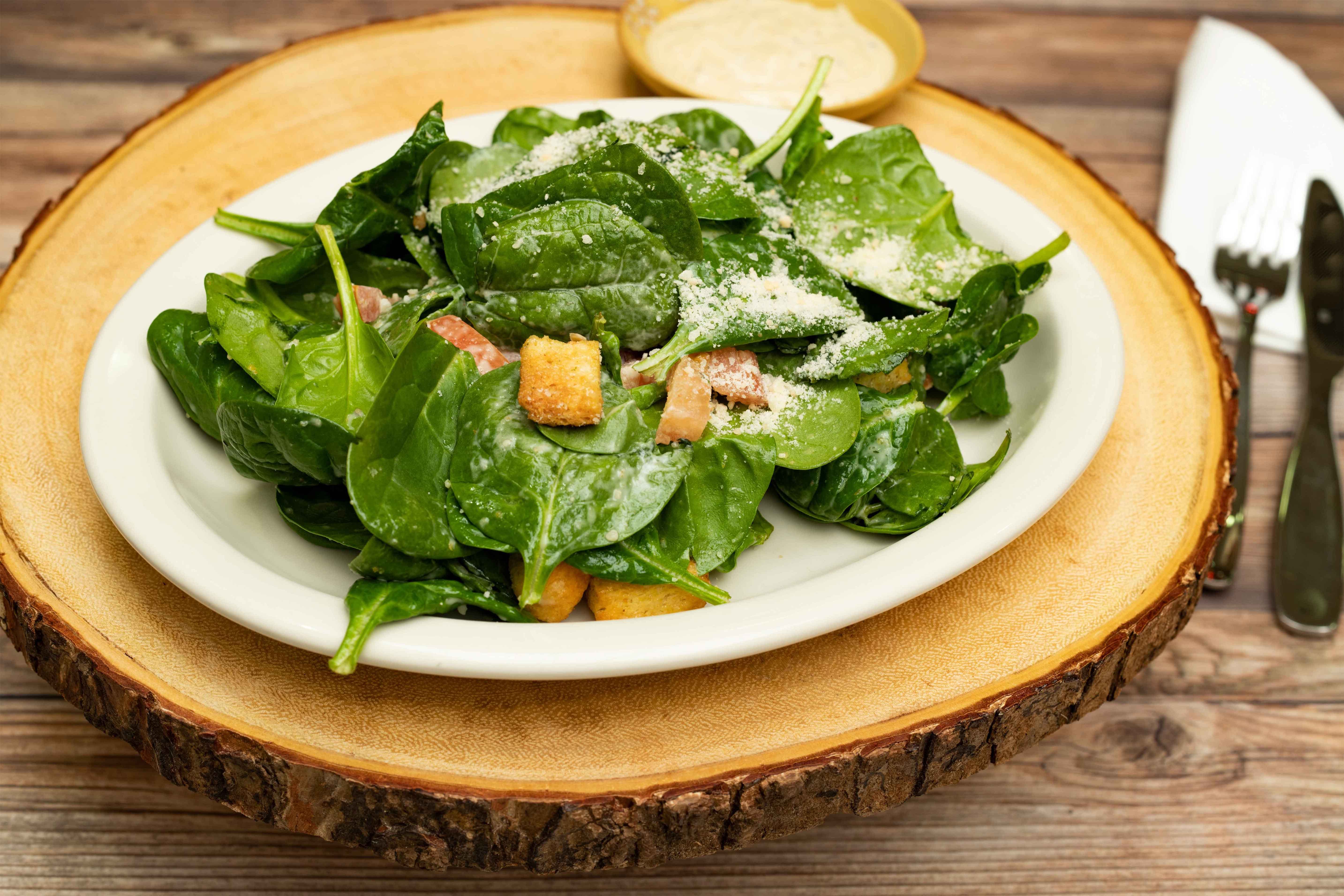 Order Spinach Caesar Salad - Salad food online from Papazzi Pizzeria store, Bellevue on bringmethat.com