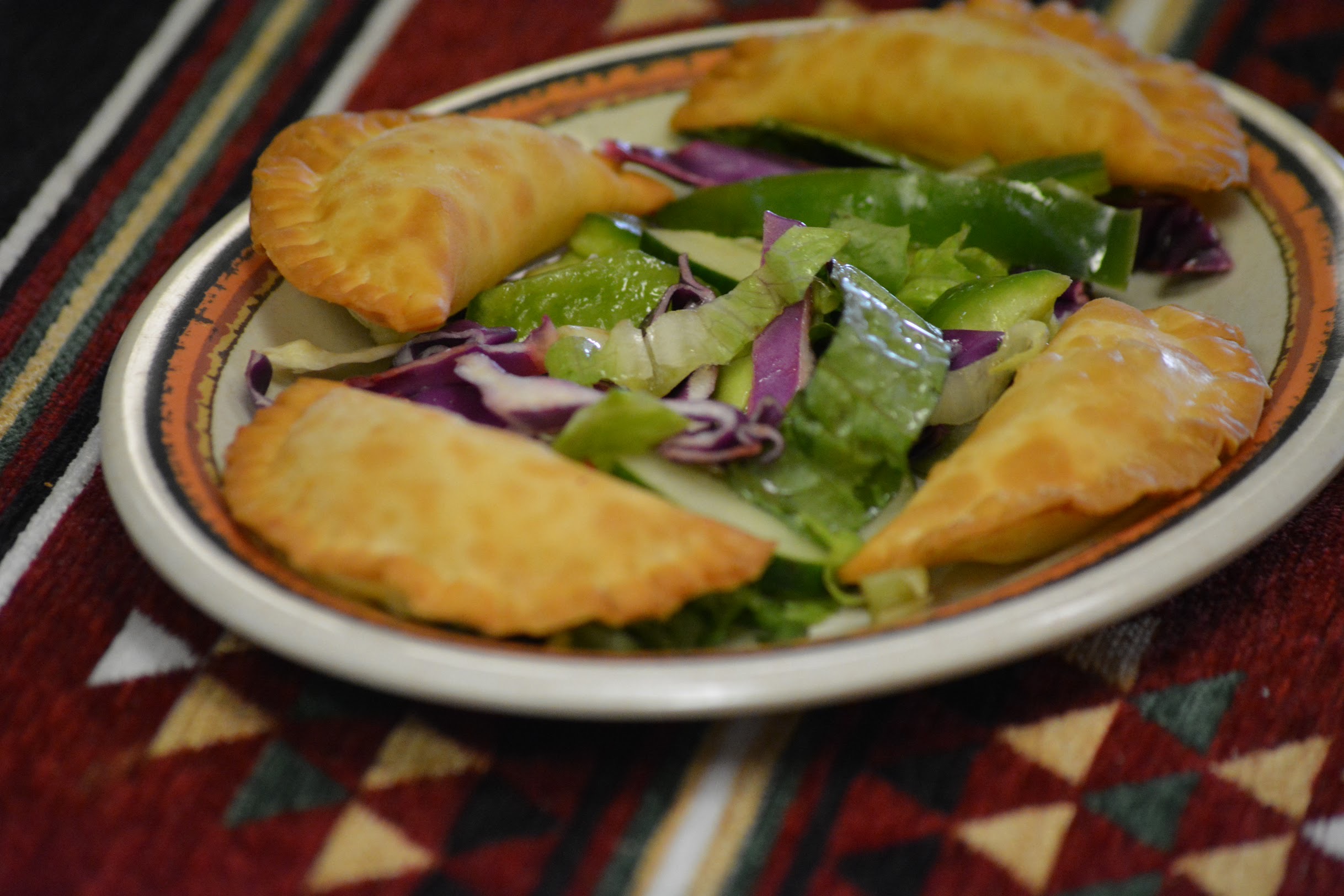 Order 4 Pieces Cheese Fatayer food online from Majeed Mediterranean Restaurant store, Saint Louis on bringmethat.com