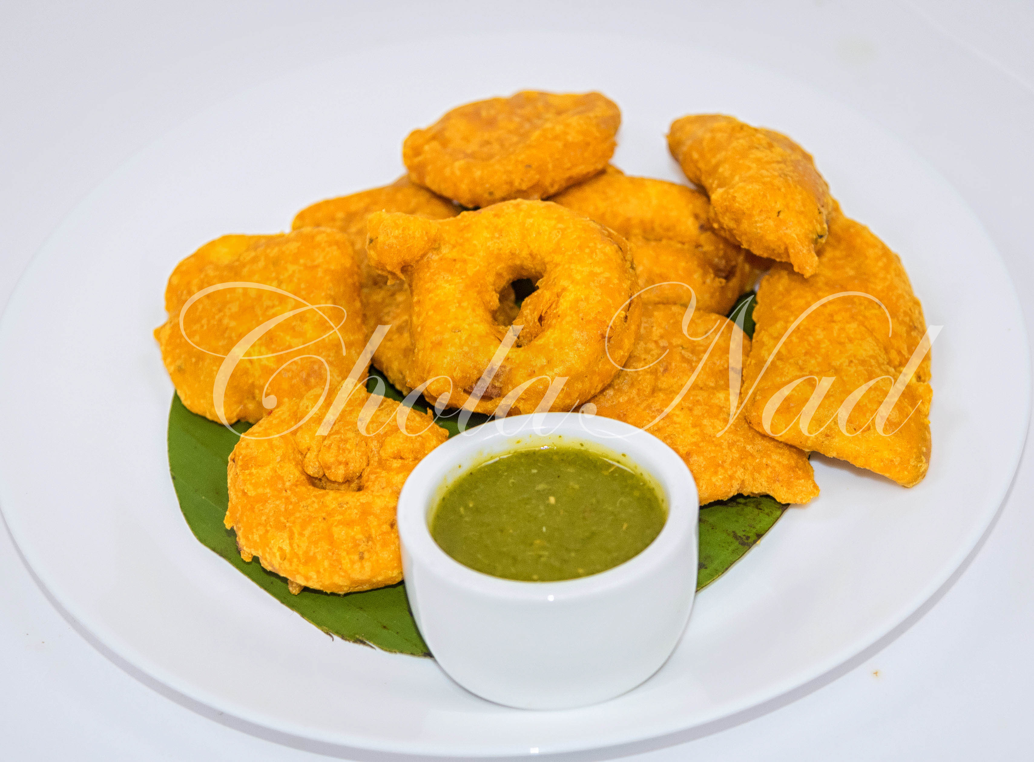Order Assorted Bajji food online from Cholanad store, Chapel Hill on bringmethat.com